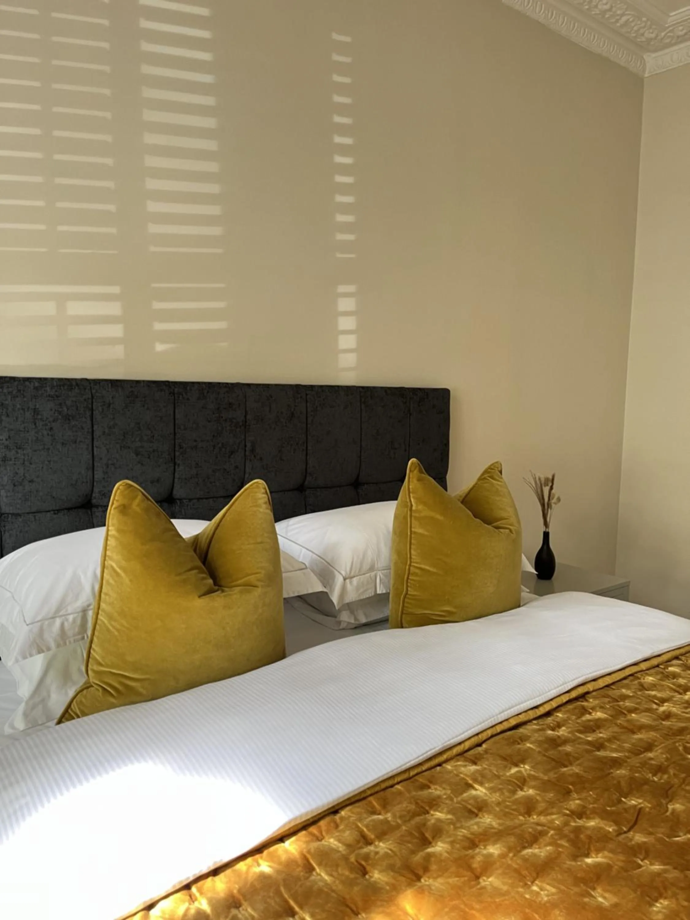Bed in Belgravia Apartments