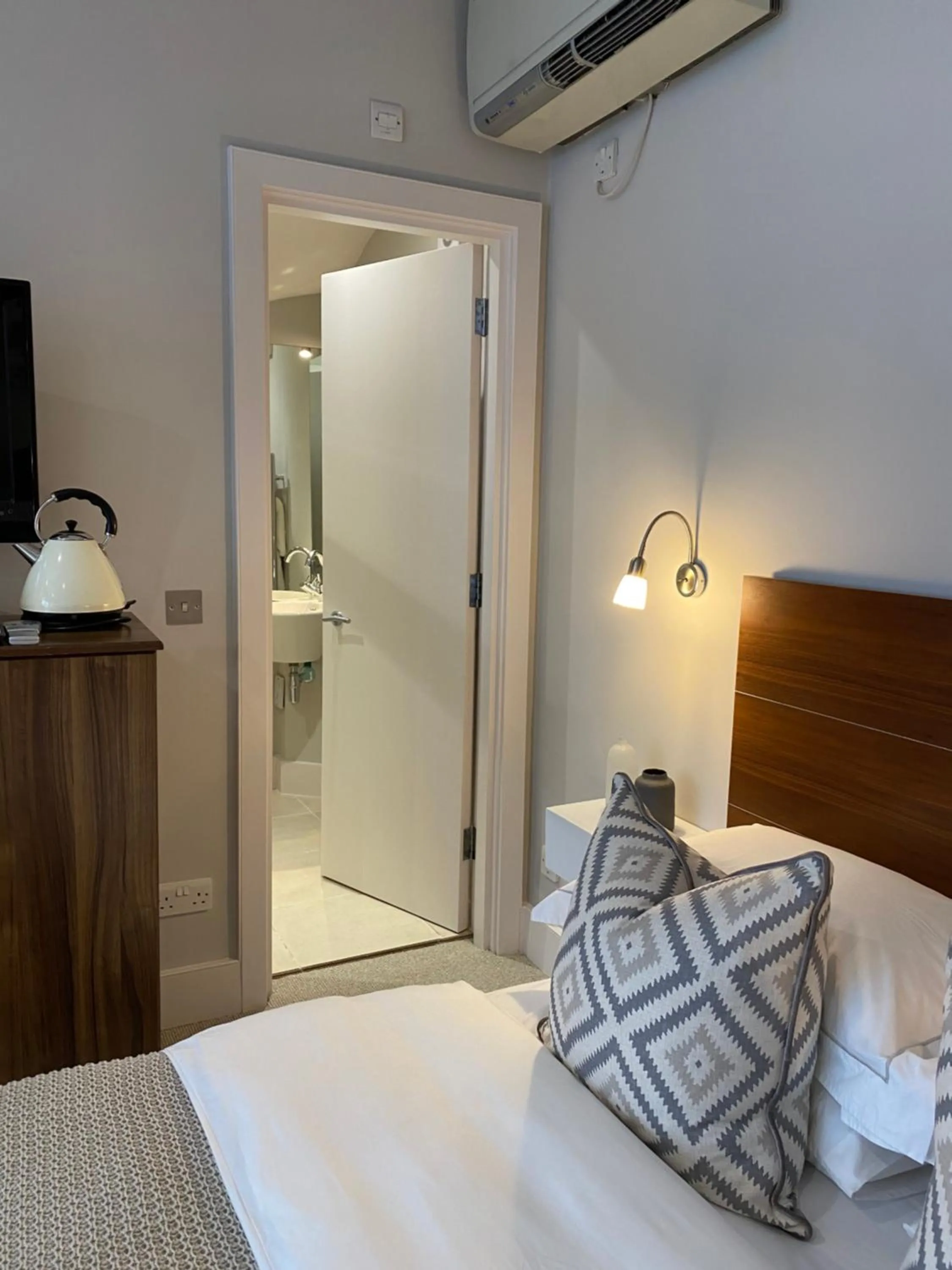 Bed in Belgravia Apartments