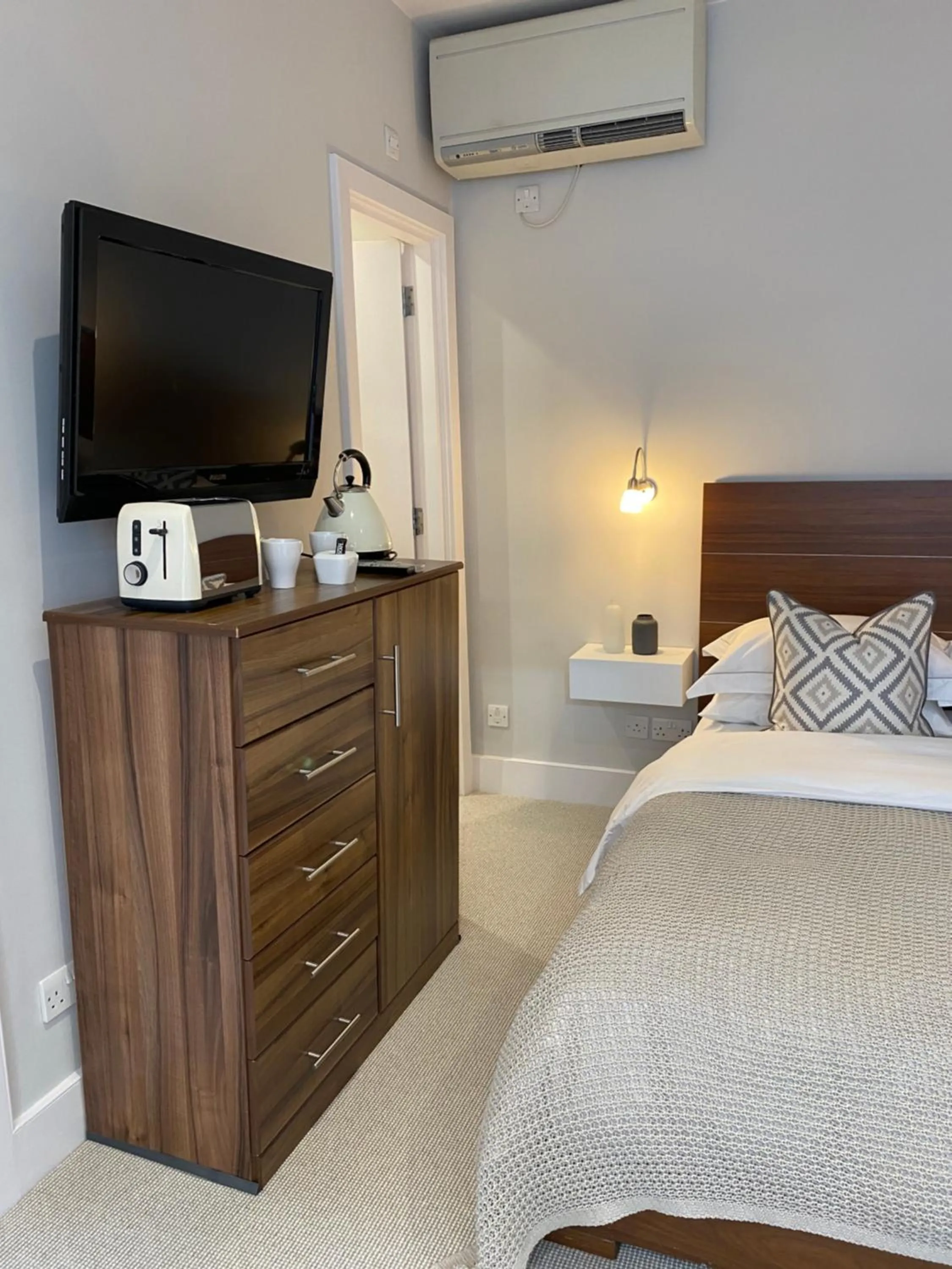 Bed in Belgravia Apartments