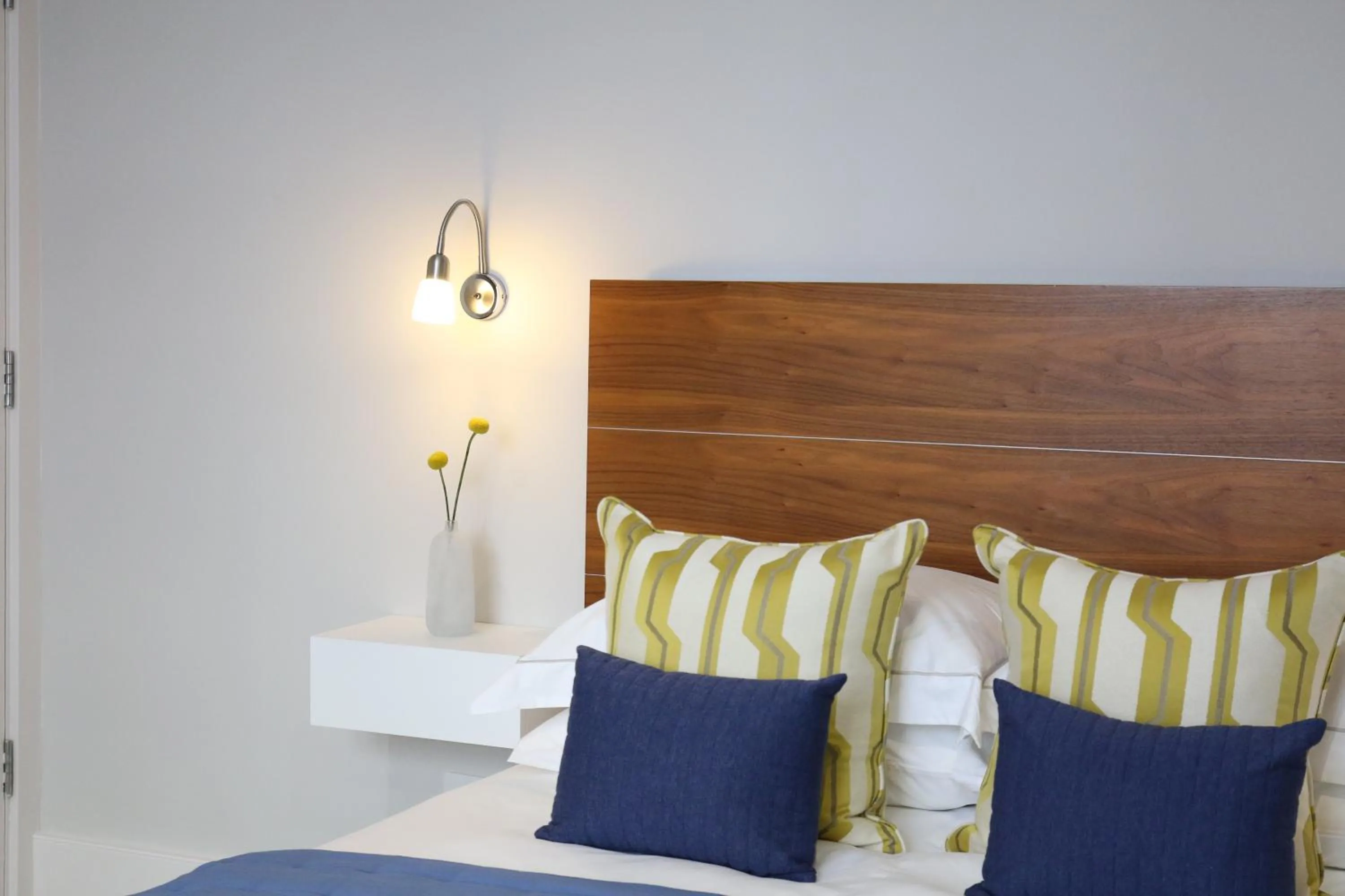 Bed in Belgravia Apartments