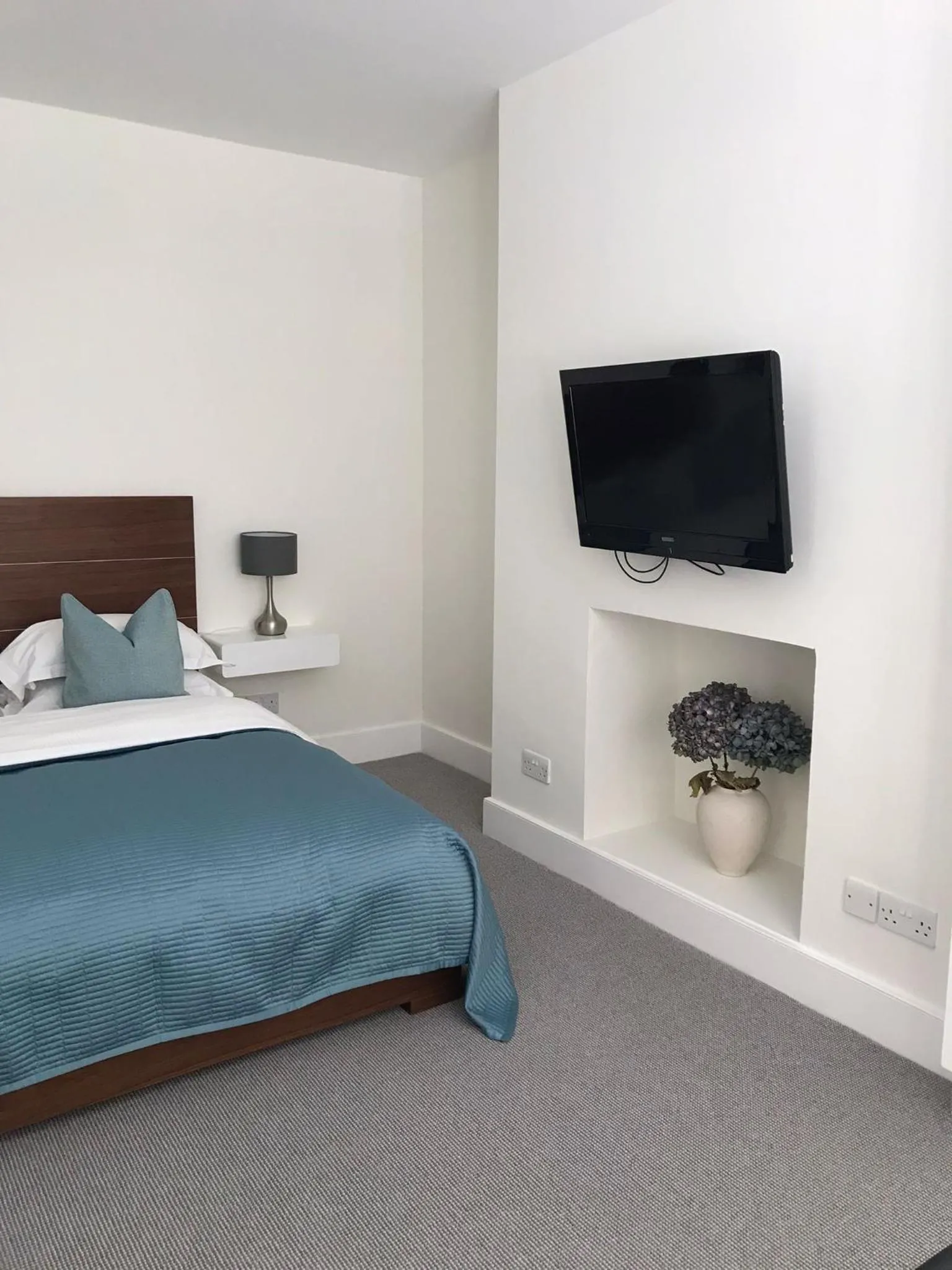Bed in Belgravia Apartments