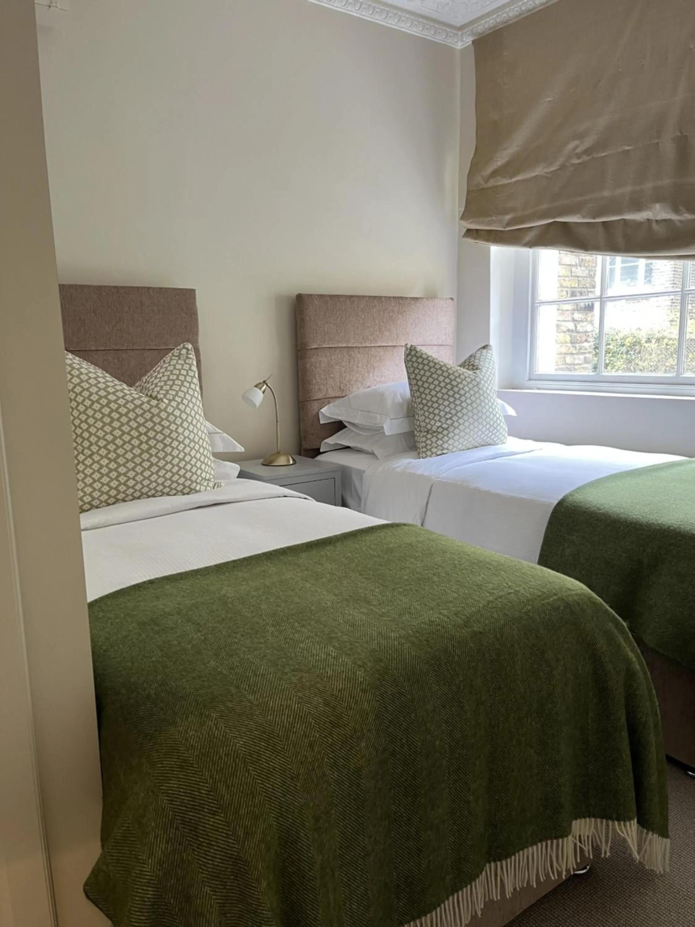 Bed in Belgravia Apartments