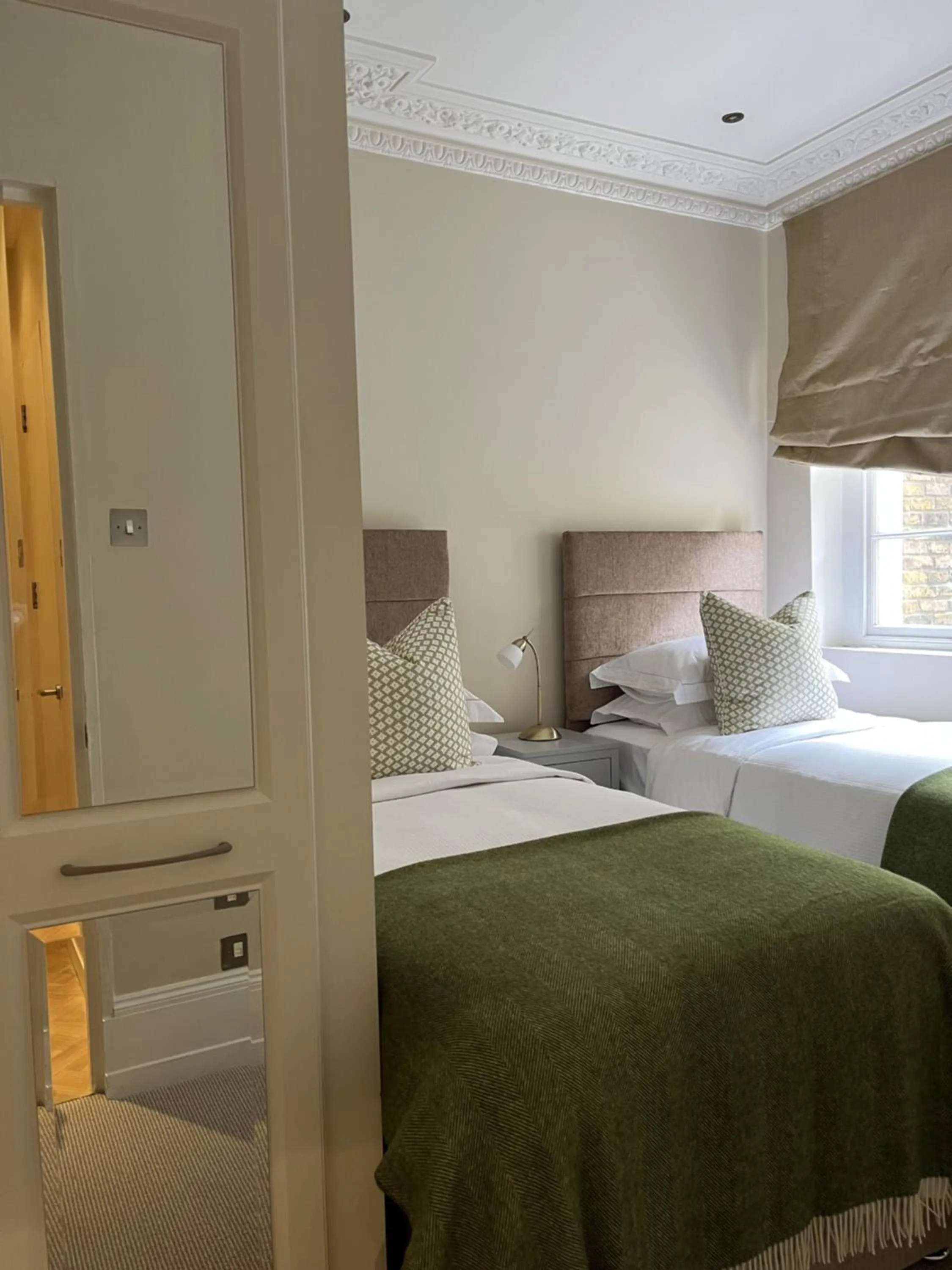 Bed in Belgravia Apartments