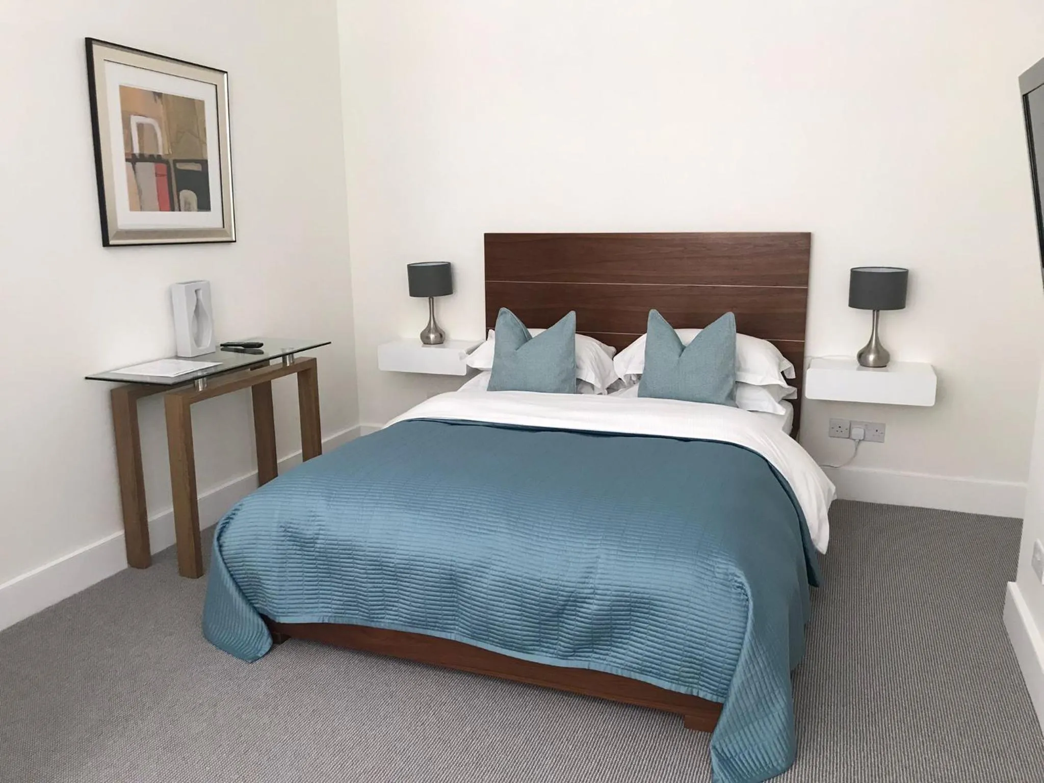 Bed in Belgravia Apartments