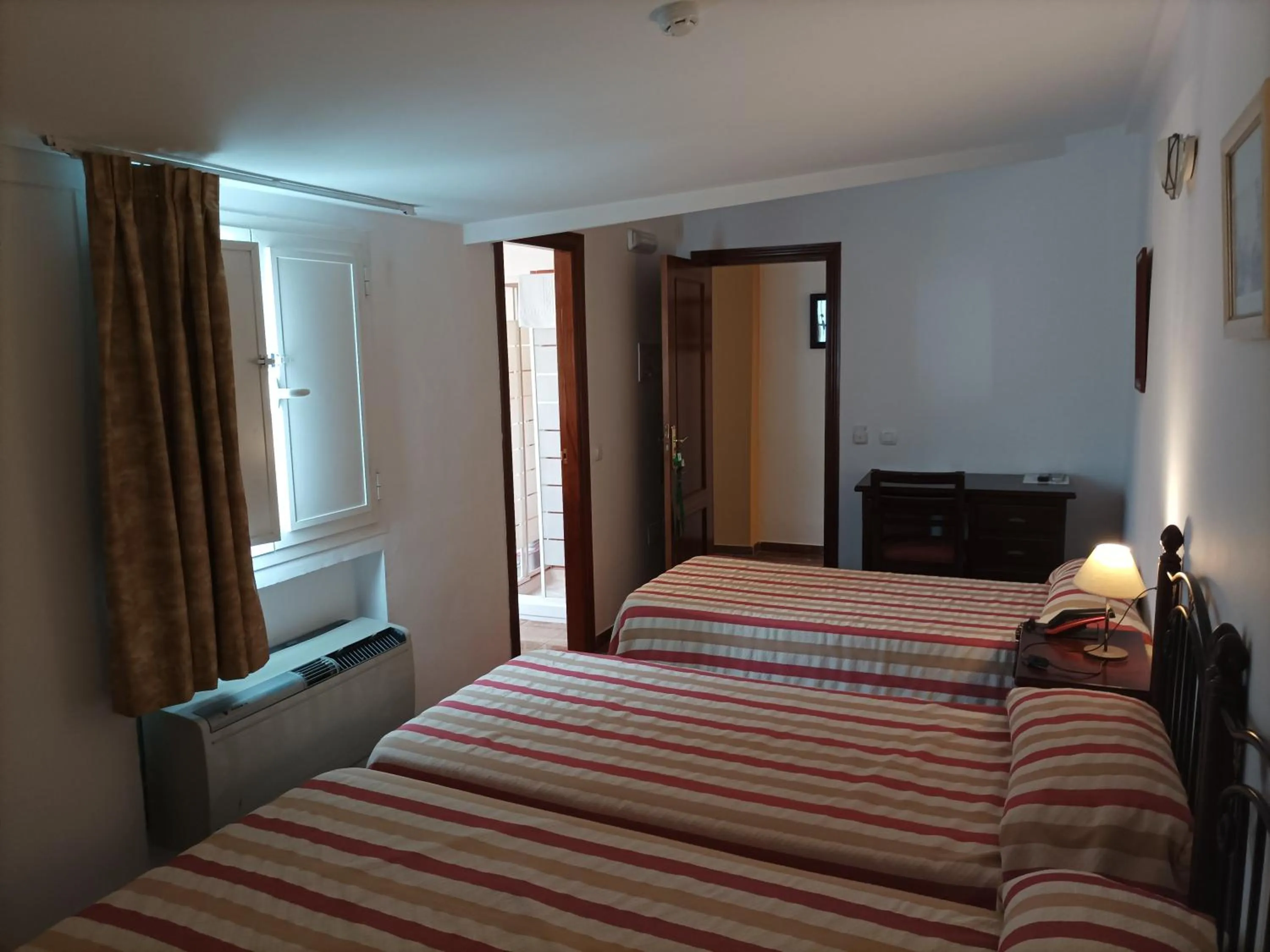 Photo of the whole room, Bed in Hostal San Cayetano