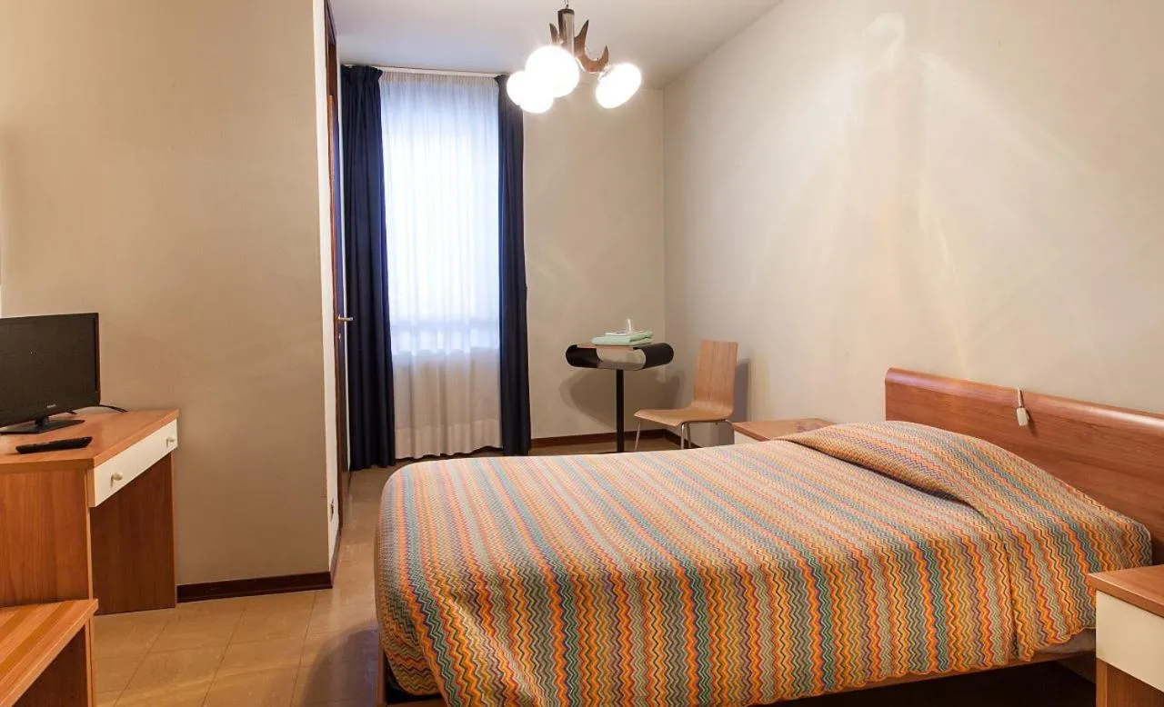 Bed in Albergo Michielini
