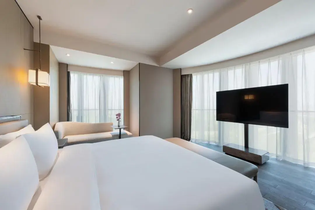 Bed in Grand Mercure Shanghai Lingang Bed in Grand Mercure Shanghai Lingang