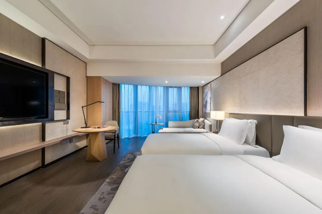 Bed in Grand Mercure Shanghai Lingang