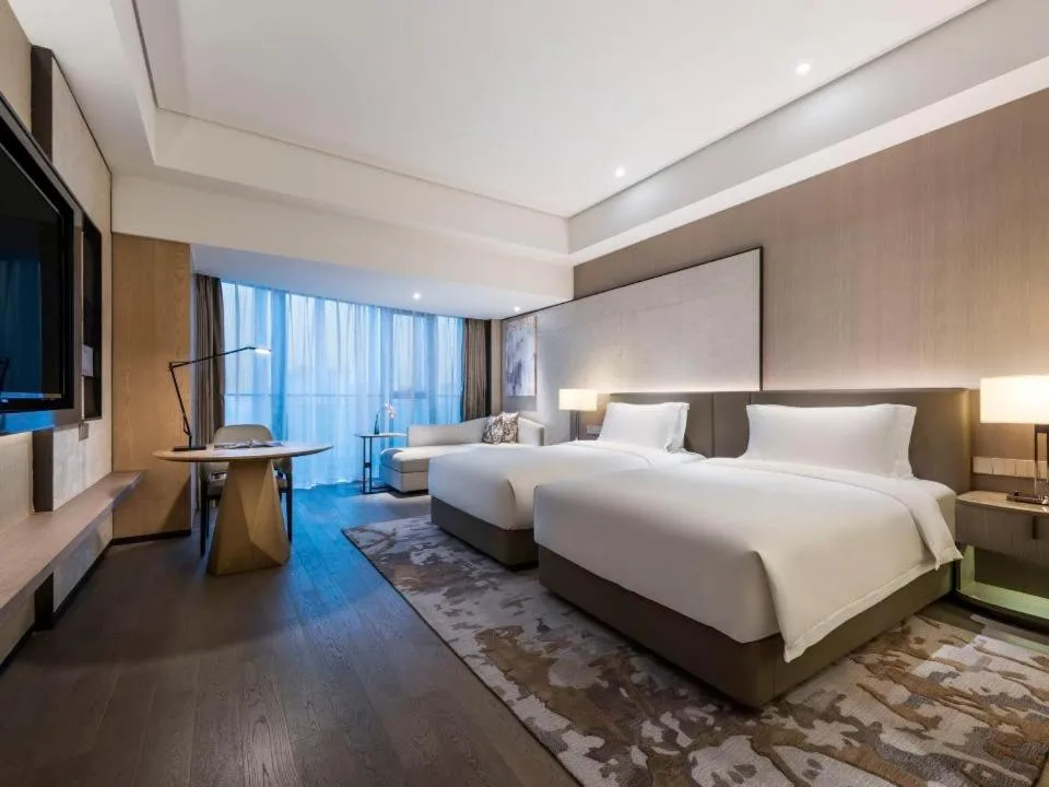 Bed in Grand Mercure Shanghai Lingang
