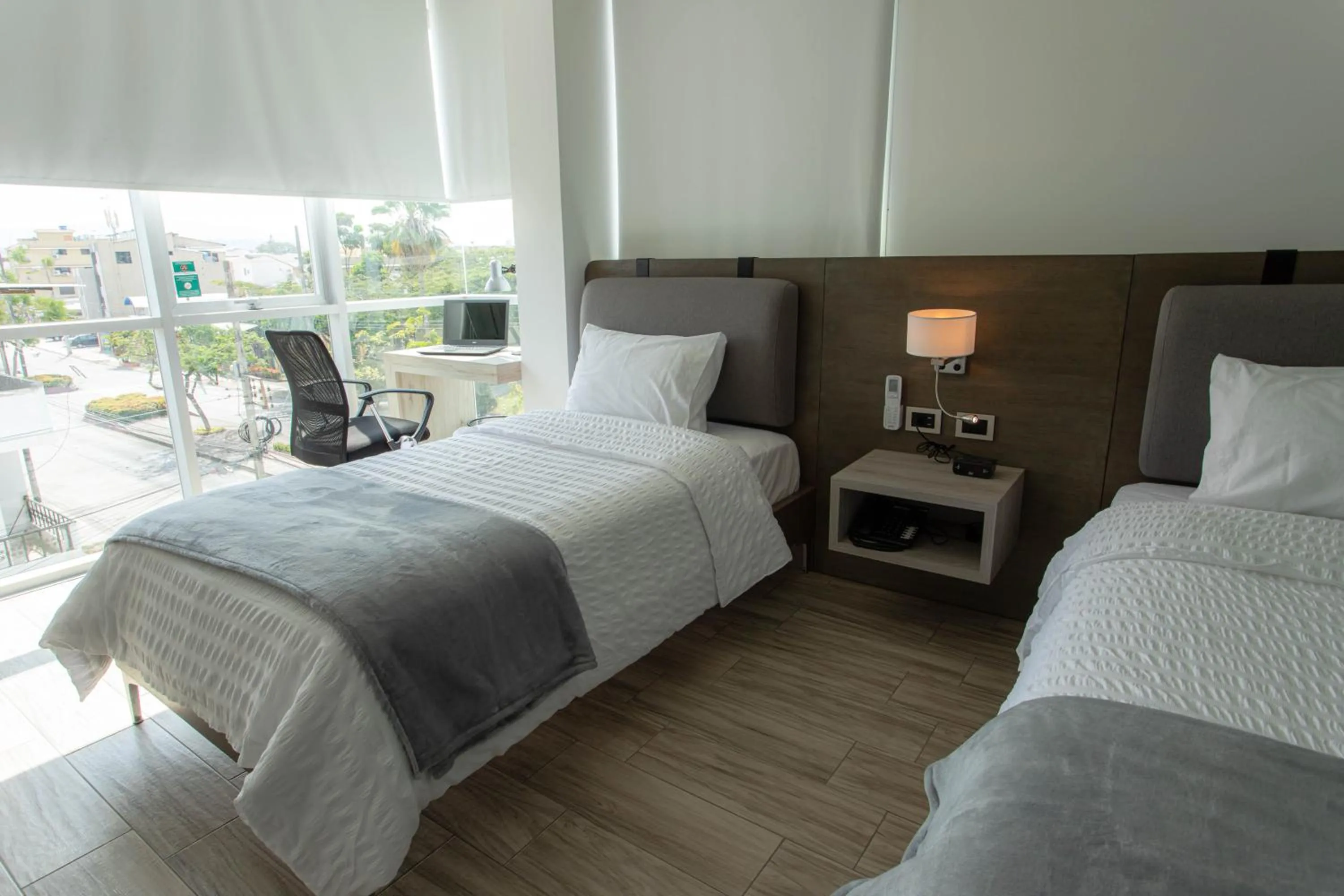 Photo of the whole room, Bed in Hotel Puerto Pacifico Guayaquil Airport