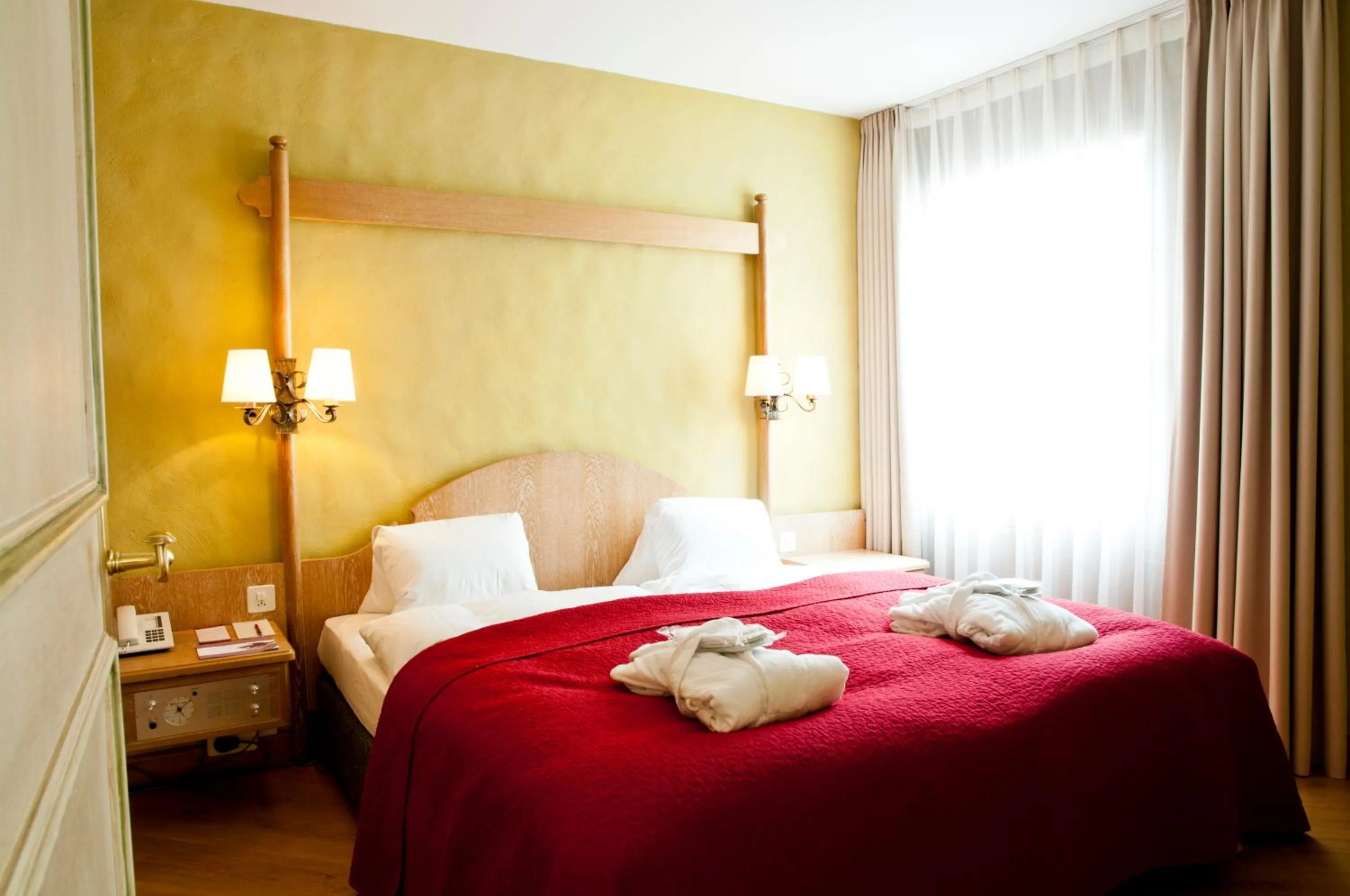 Bed in Hotel Rosatsch