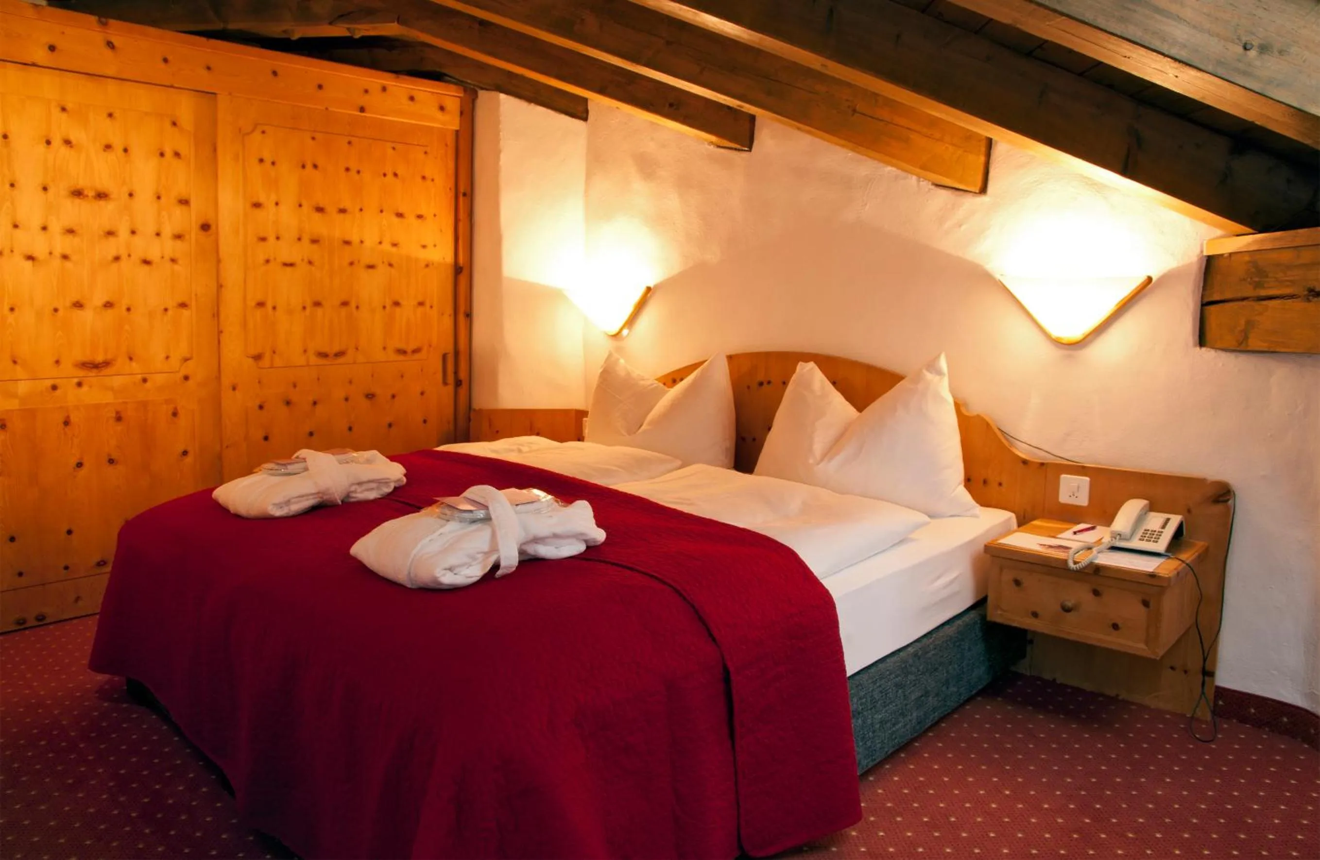 Bed in Hotel Rosatsch