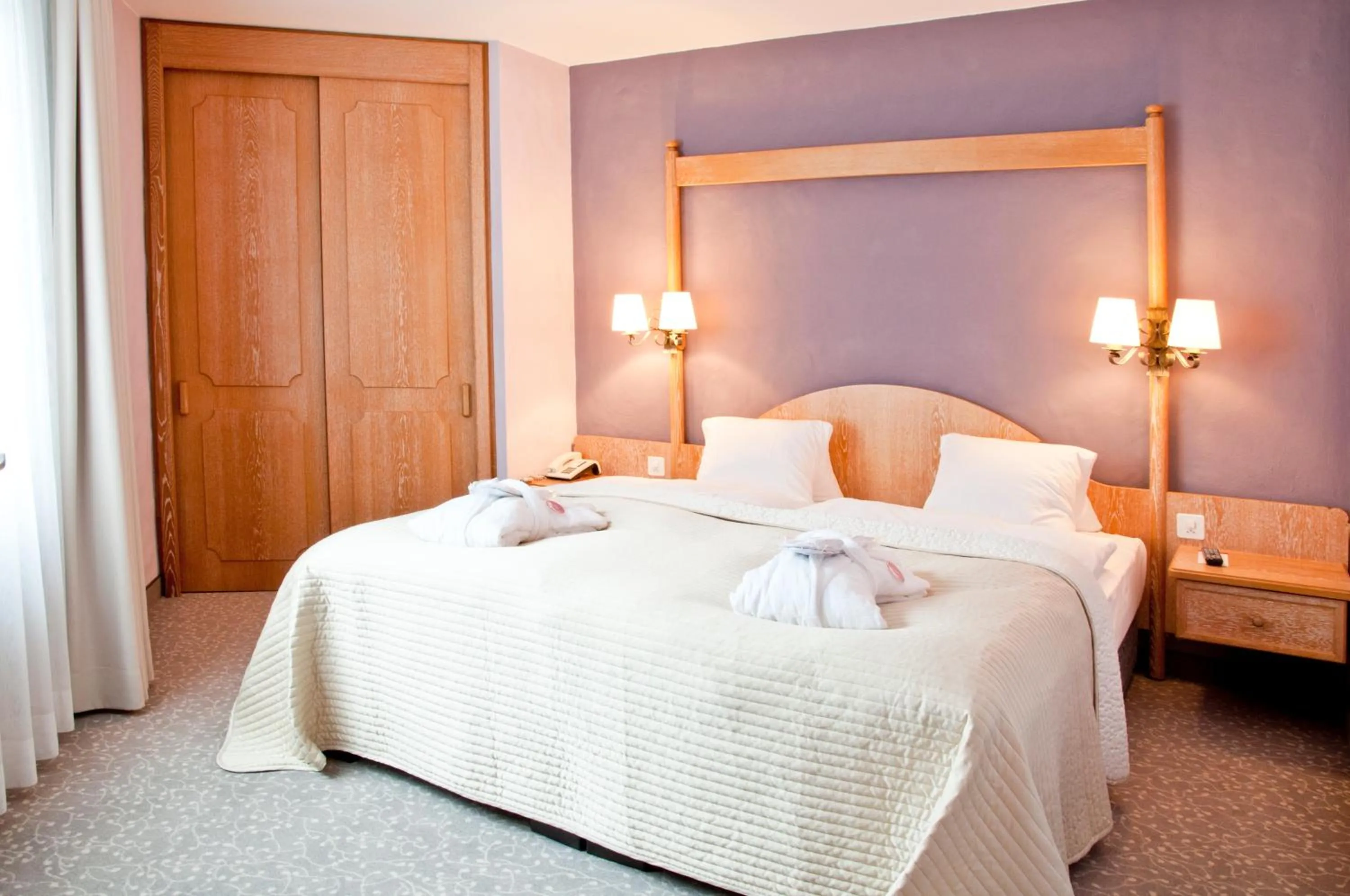 Bed in Hotel Rosatsch