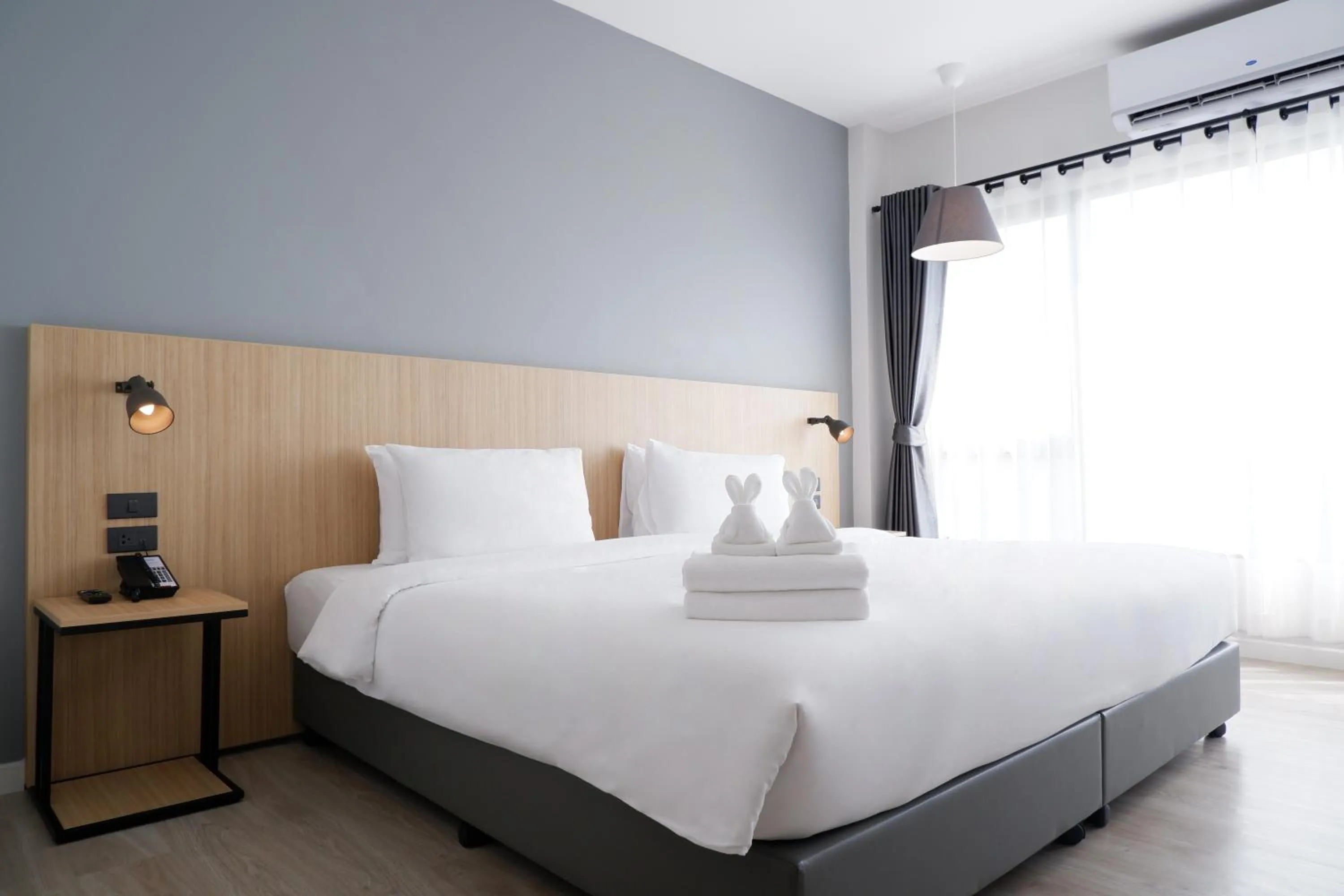 Bed in bliQ Hotel Chanthaburi