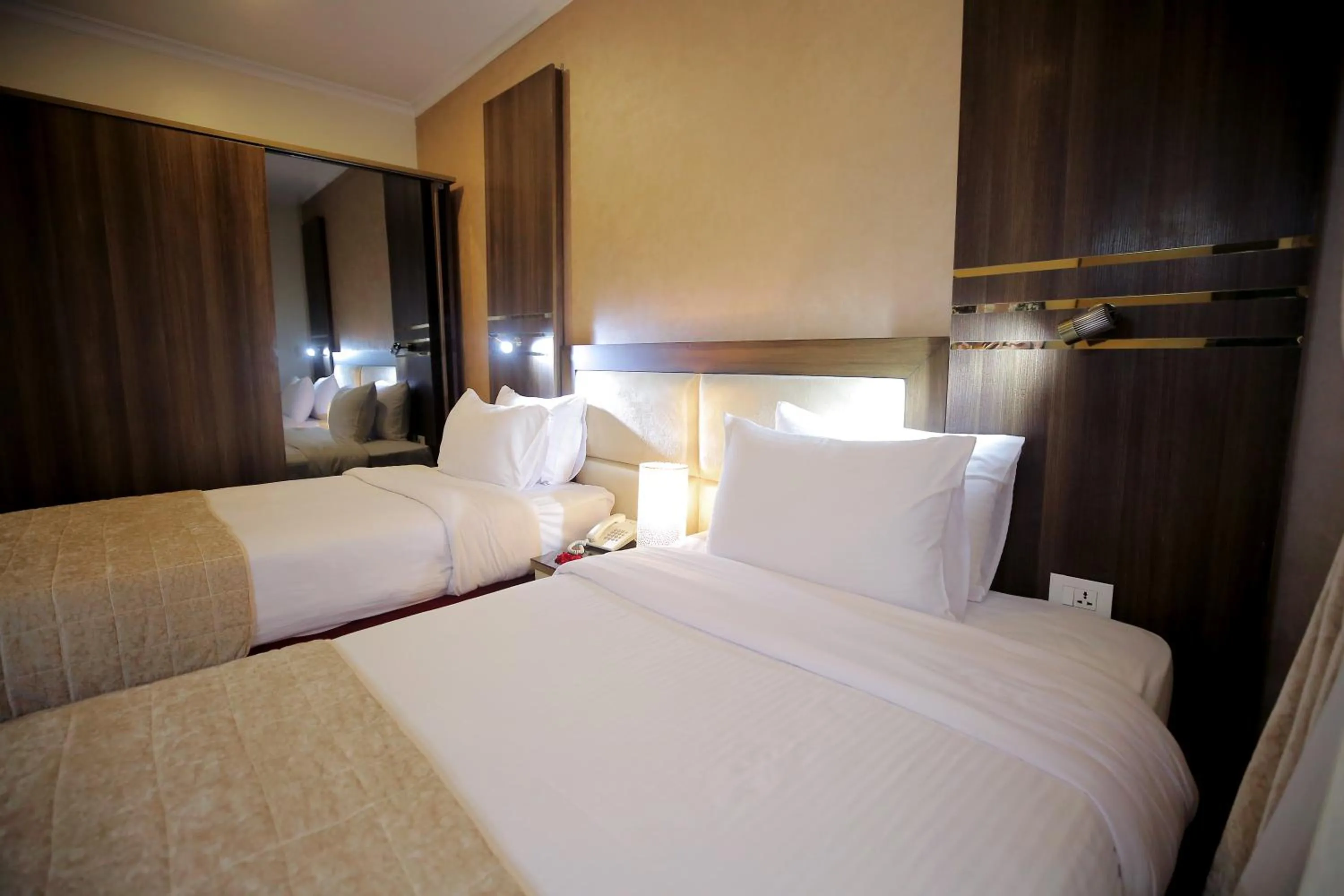 Bed in Cairo Taj Hotels & Suites - Dokki