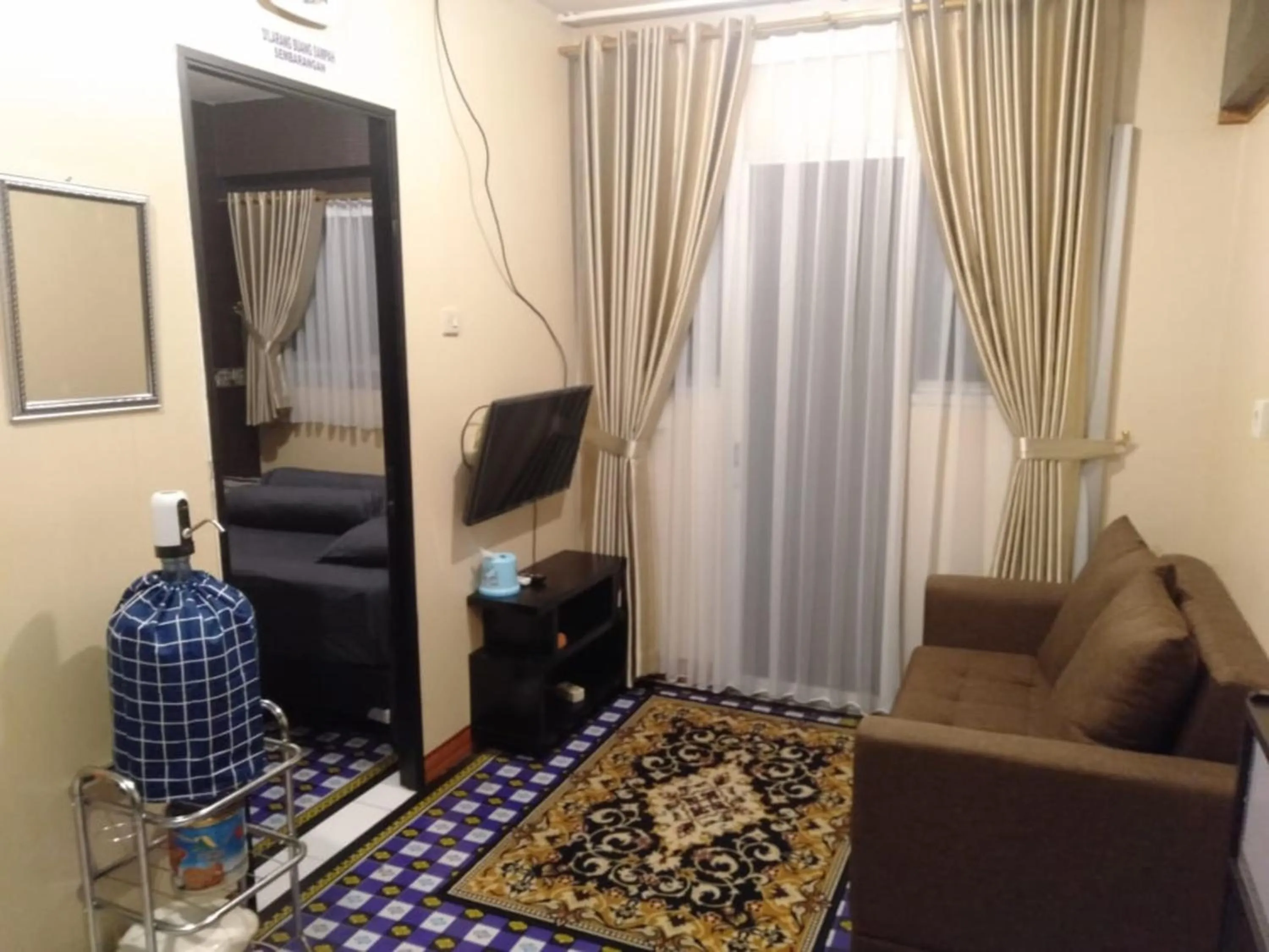 Living room in MyStayPro Sentra Timur