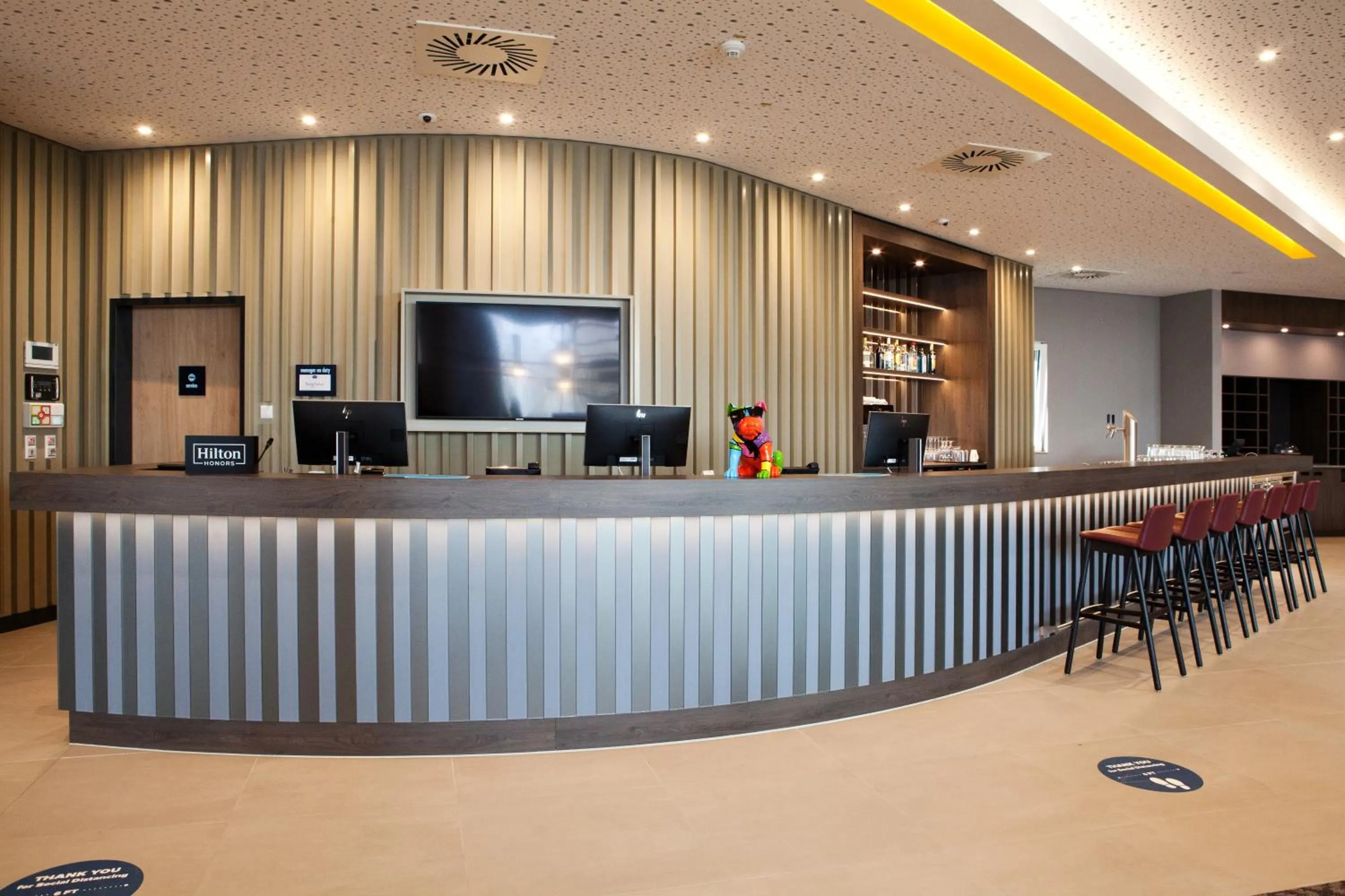 Lobby or reception in Hampton by Hilton Munich Airport South