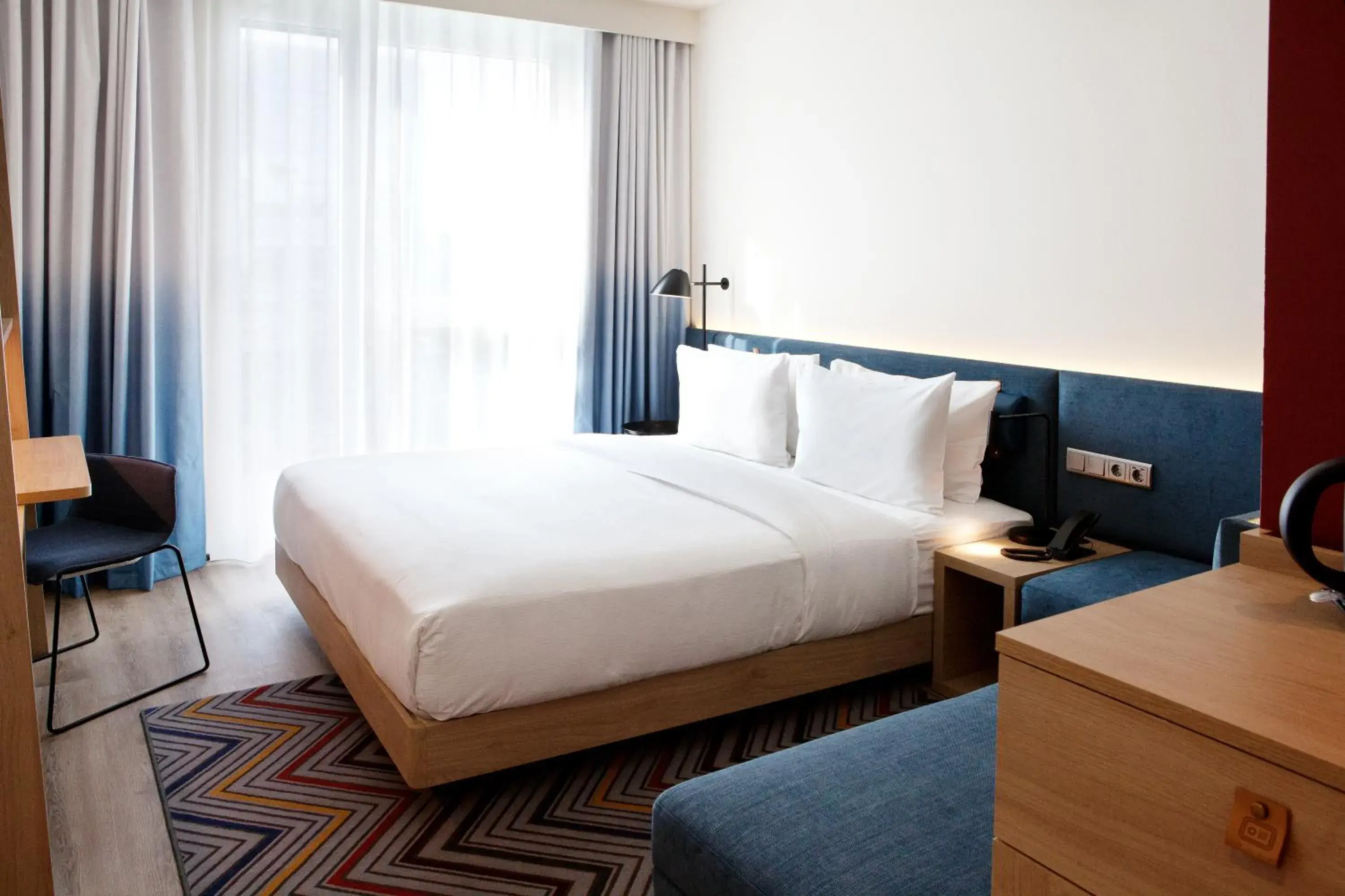 Bed in Hampton by Hilton Munich Airport South Bed in Hampton by Hilton Munich Airport South