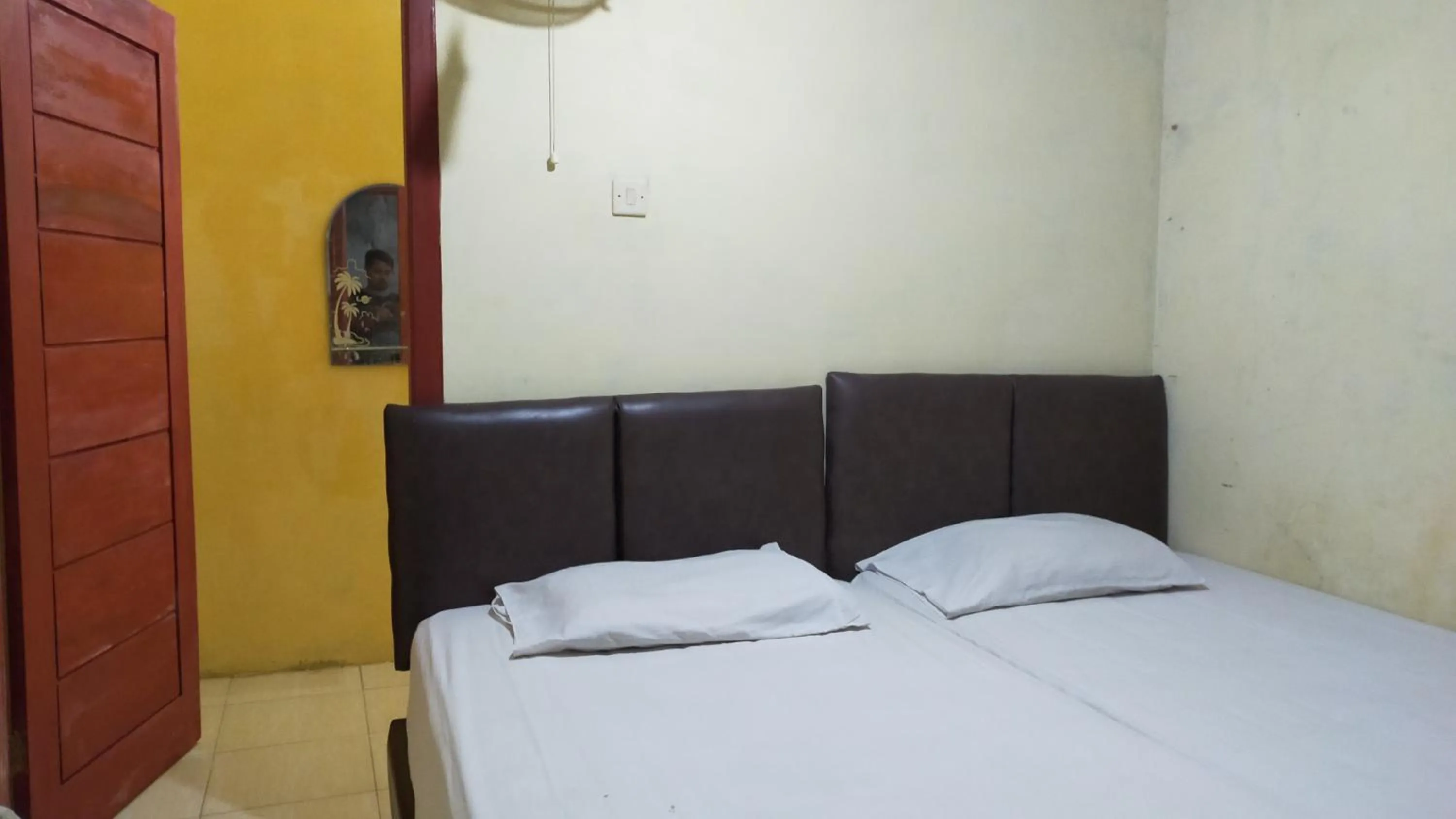 Bed in Aqsa Guest House Banjarsari