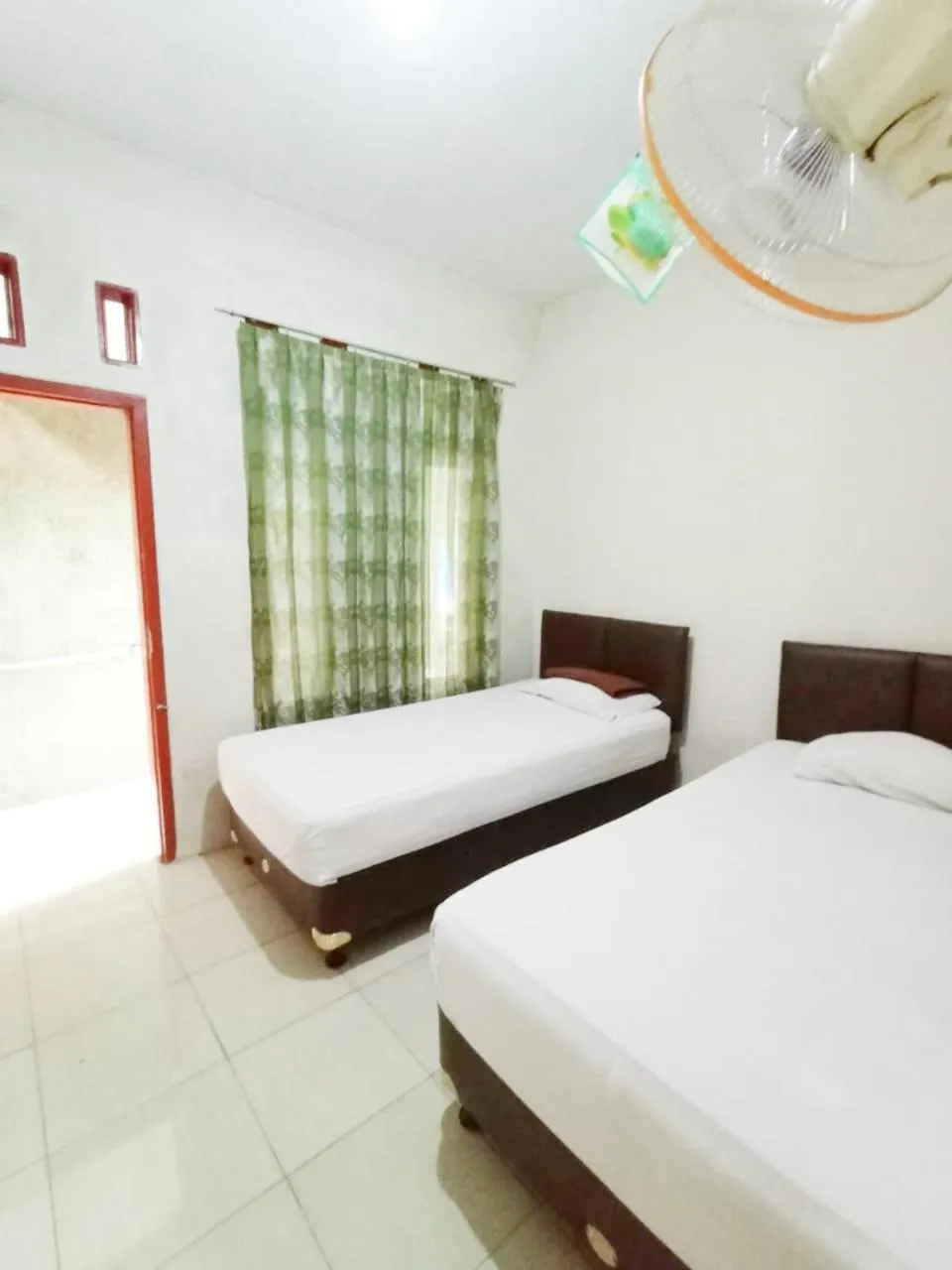 Bed in Aqsa Guest House Banjarsari