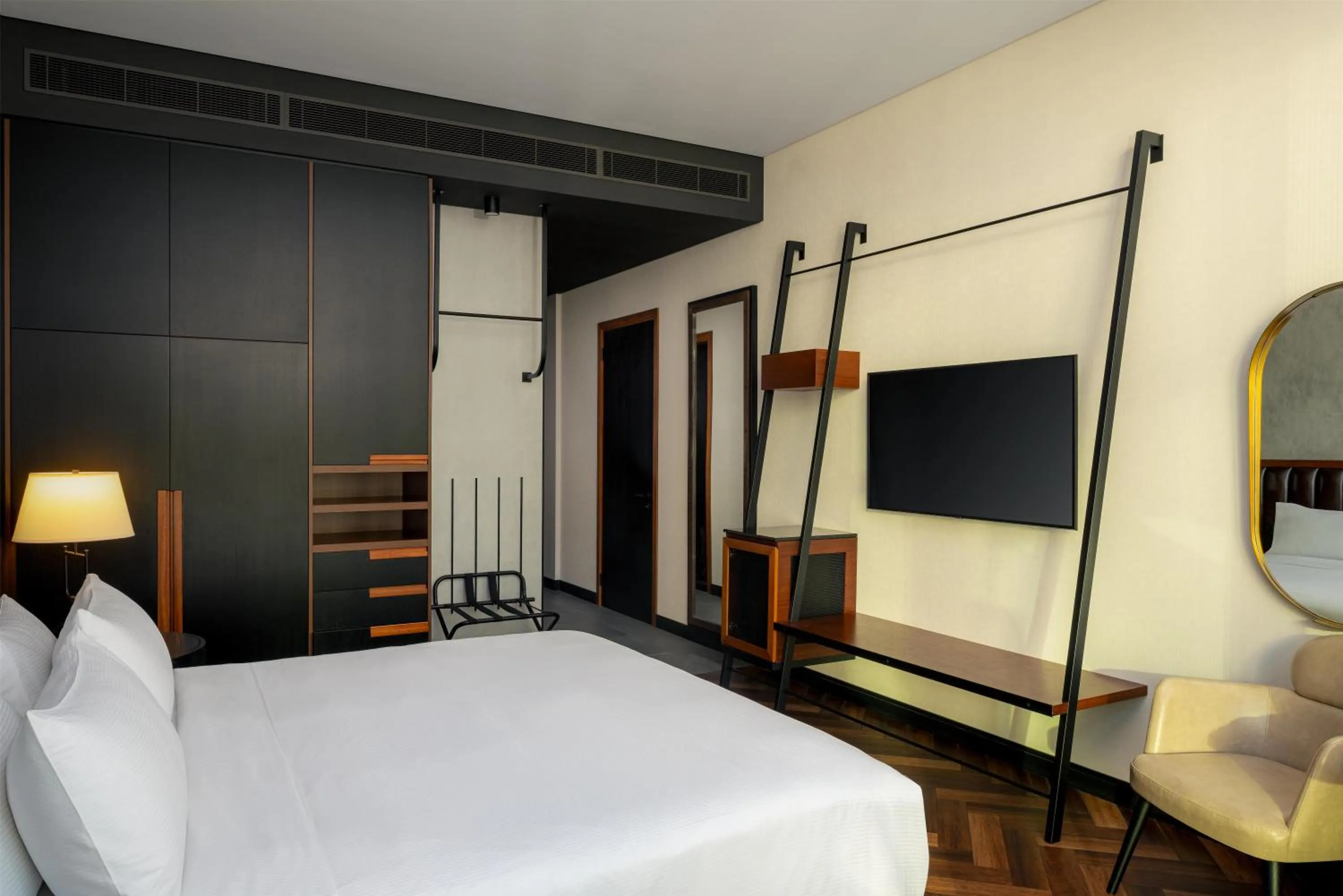 Bed in DoubleTree by Hilton Dubai M Square Hotel & Residences