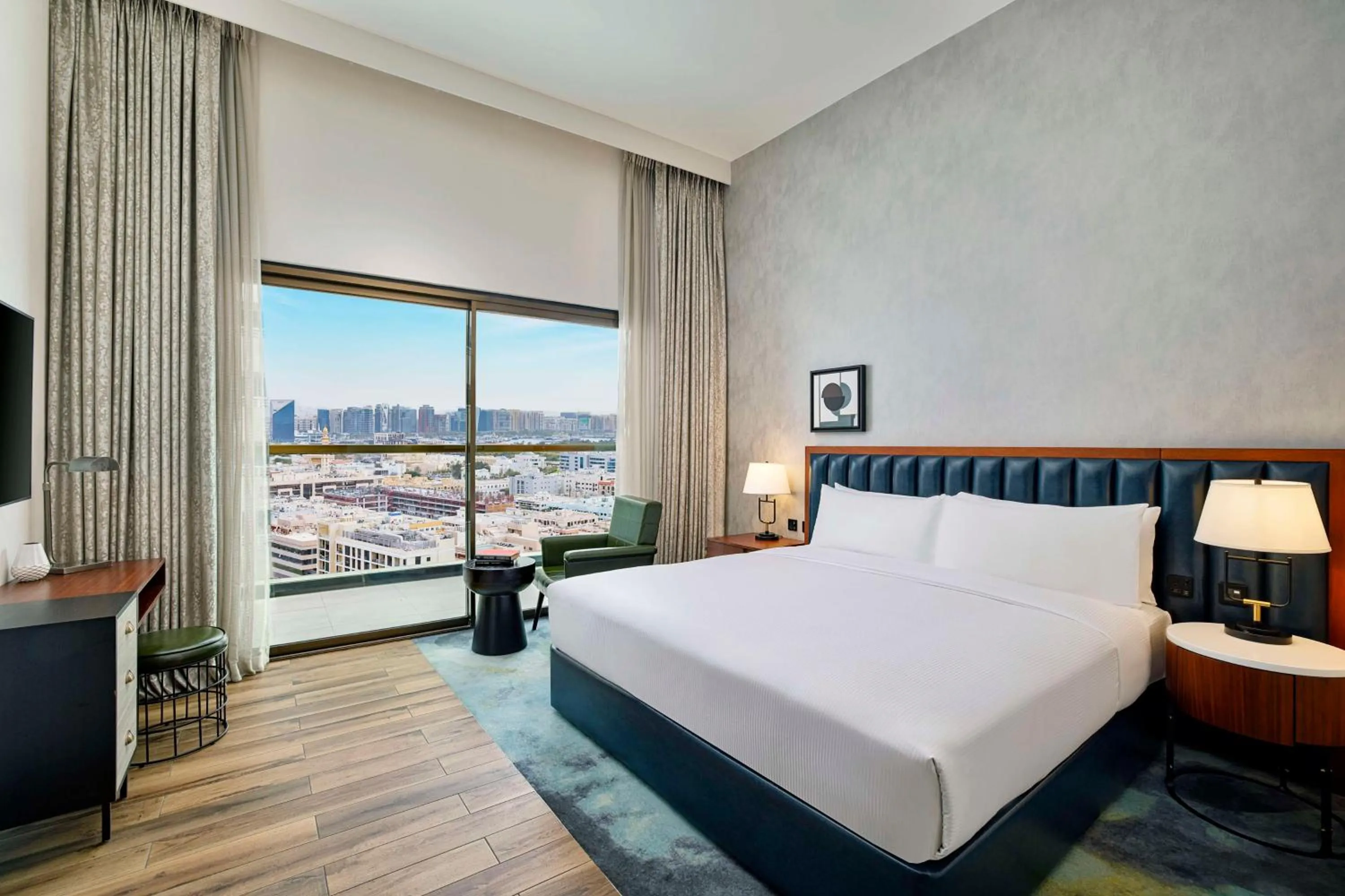 Bed in DoubleTree by Hilton Dubai M Square Hotel & Residences