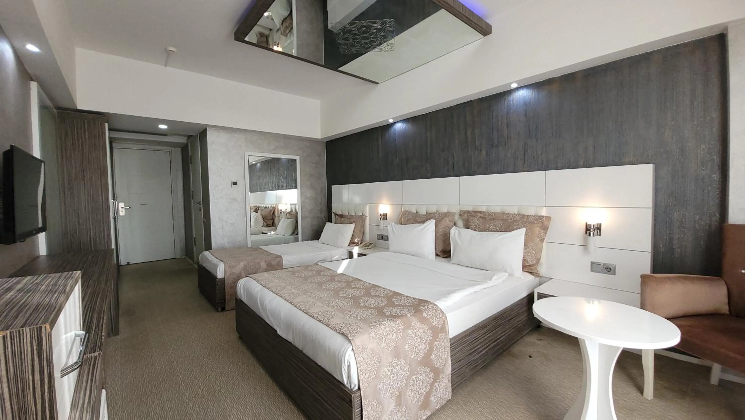 Bed in MOX Hotel Wellness & Spa
