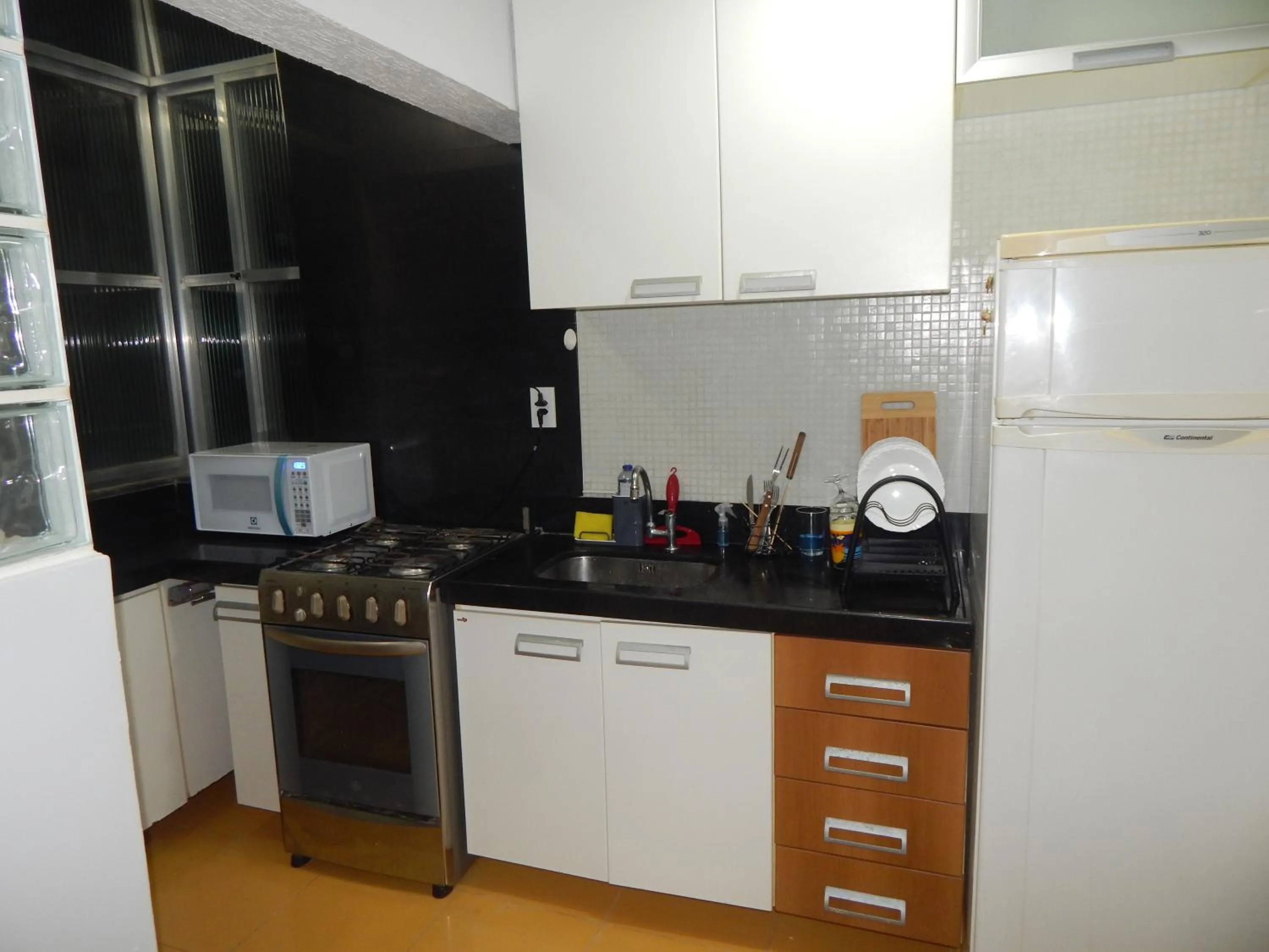 Communal kitchen in Varandas da Praia do Forte - Apartamento frente ao Mar