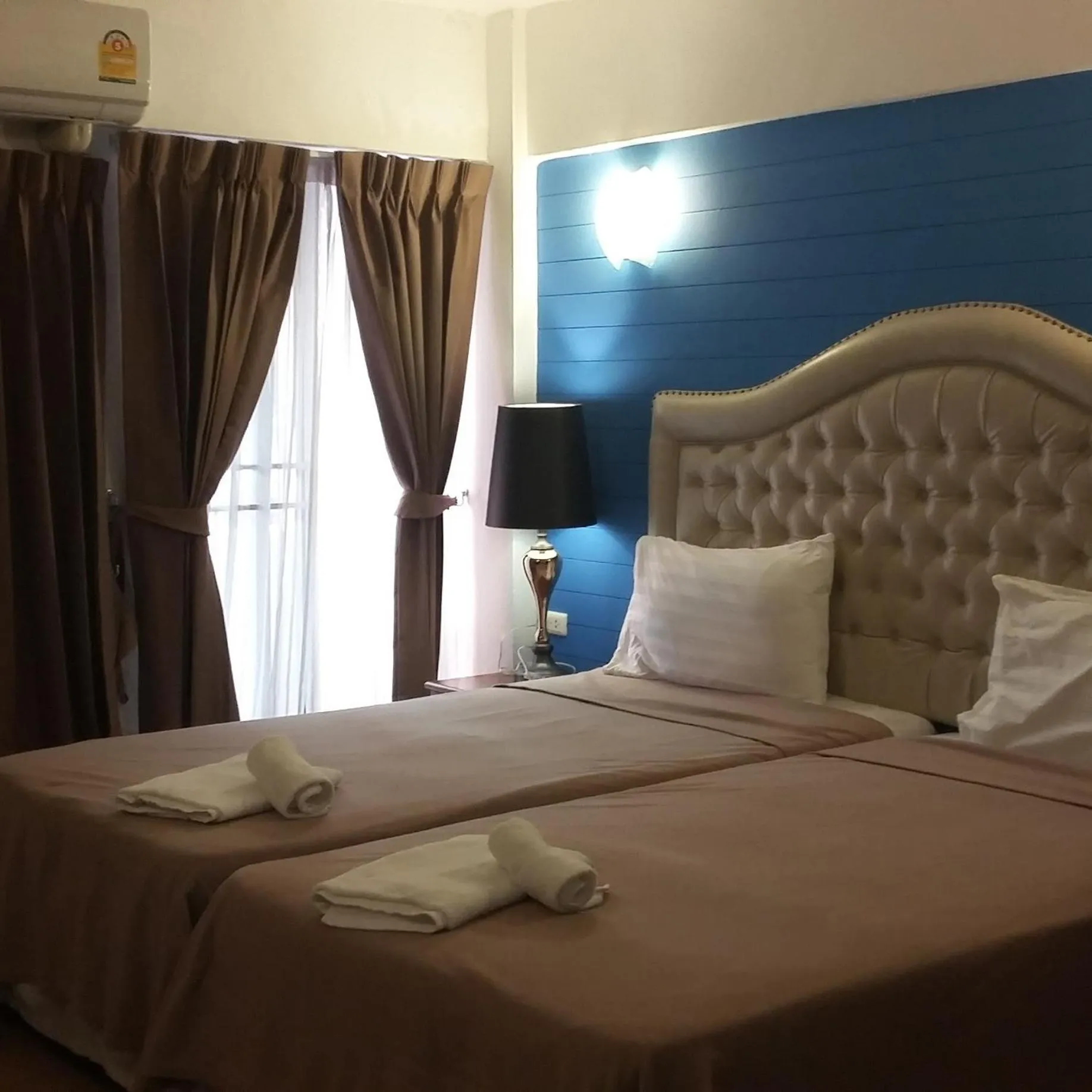 Bed in I-Inn Hotel