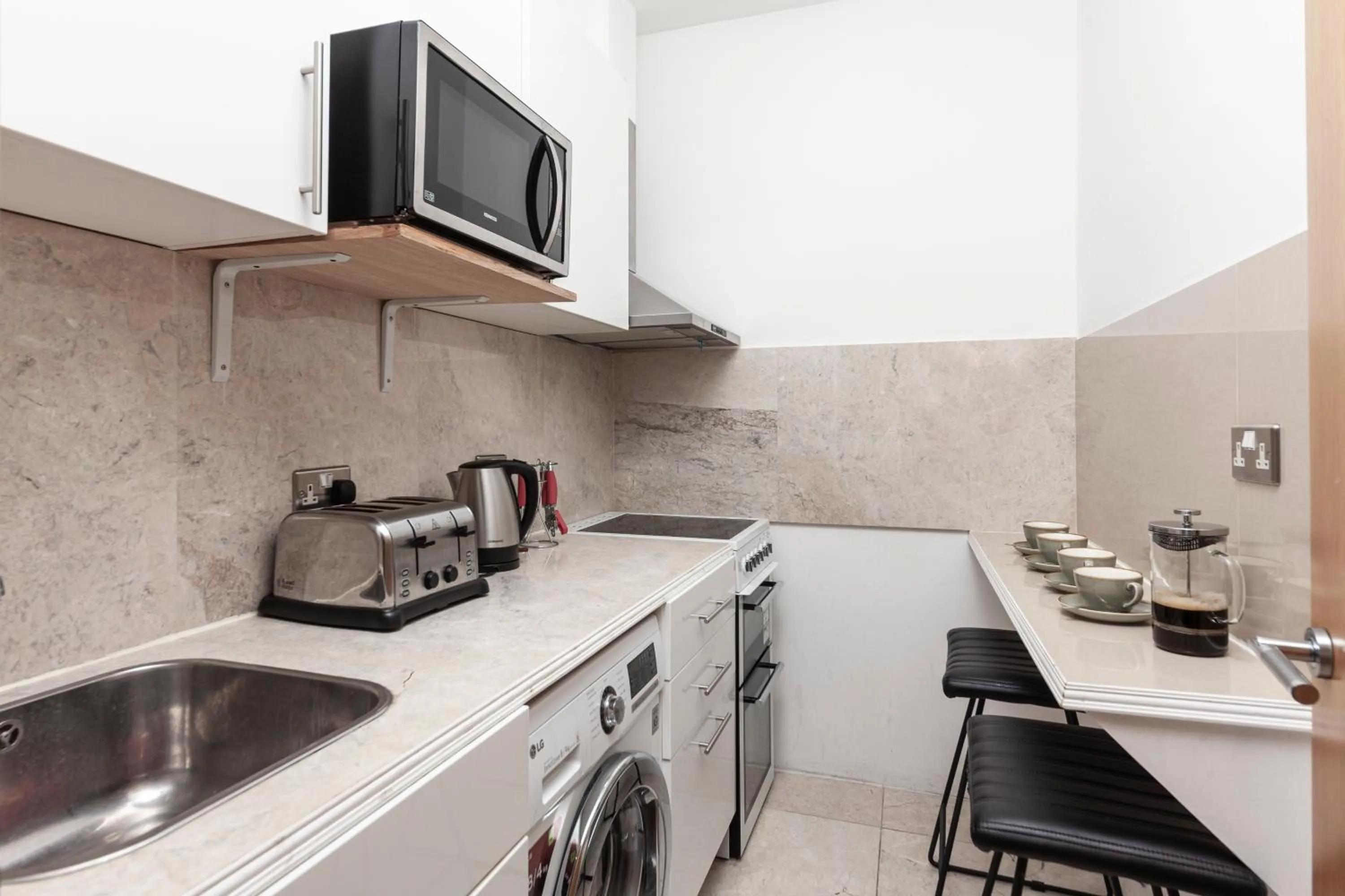 Kitchen or kitchenette in Argyle Apart Hotel