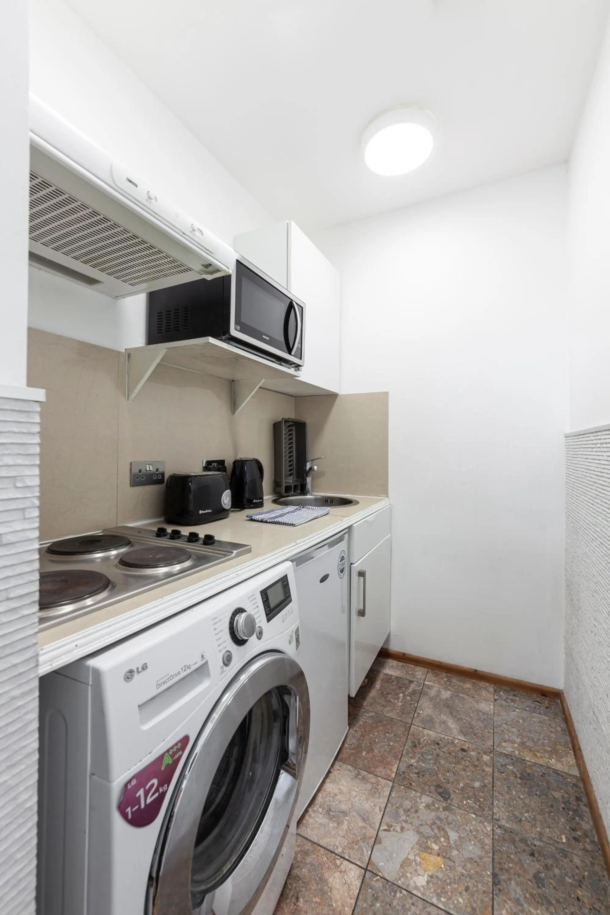 Kitchen or kitchenette in Argyle Apart Hotel