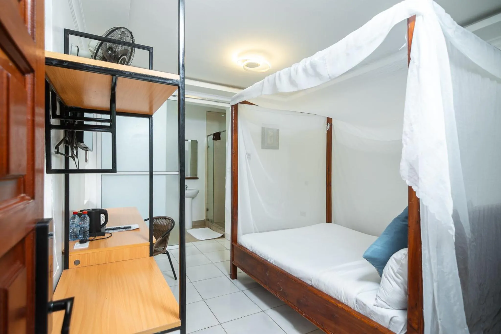 Photo of the whole room, Bed in Harry's Kisumu Oasis