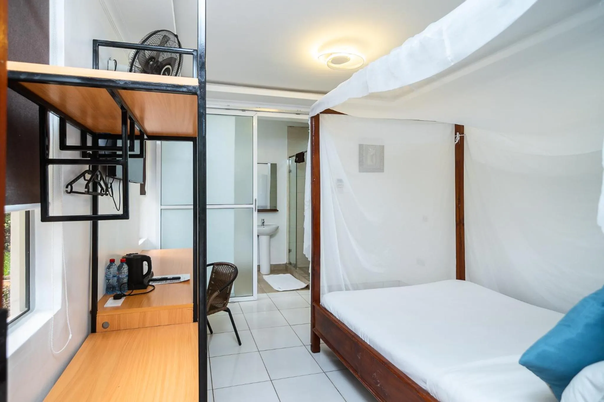 Photo of the whole room, Bed in Harry's Kisumu Oasis