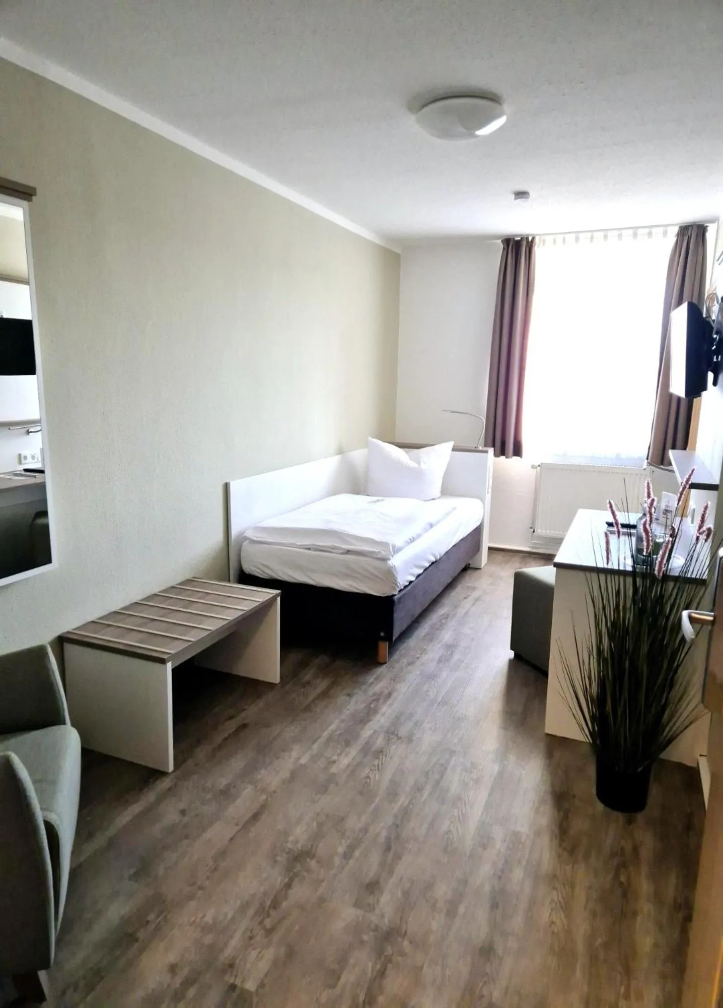 Photo of the whole room, Bed in Hotel am Schlosspark