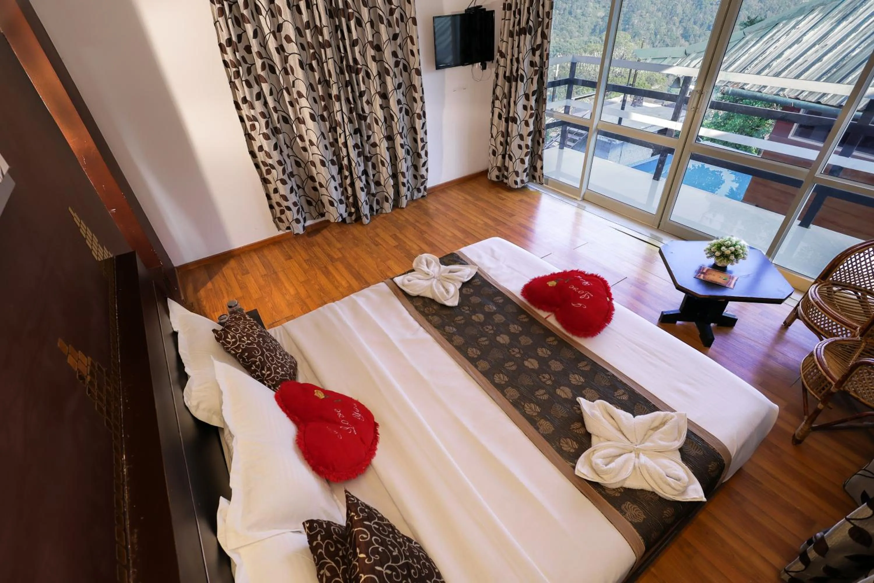 Bed in Green Trees Munnar