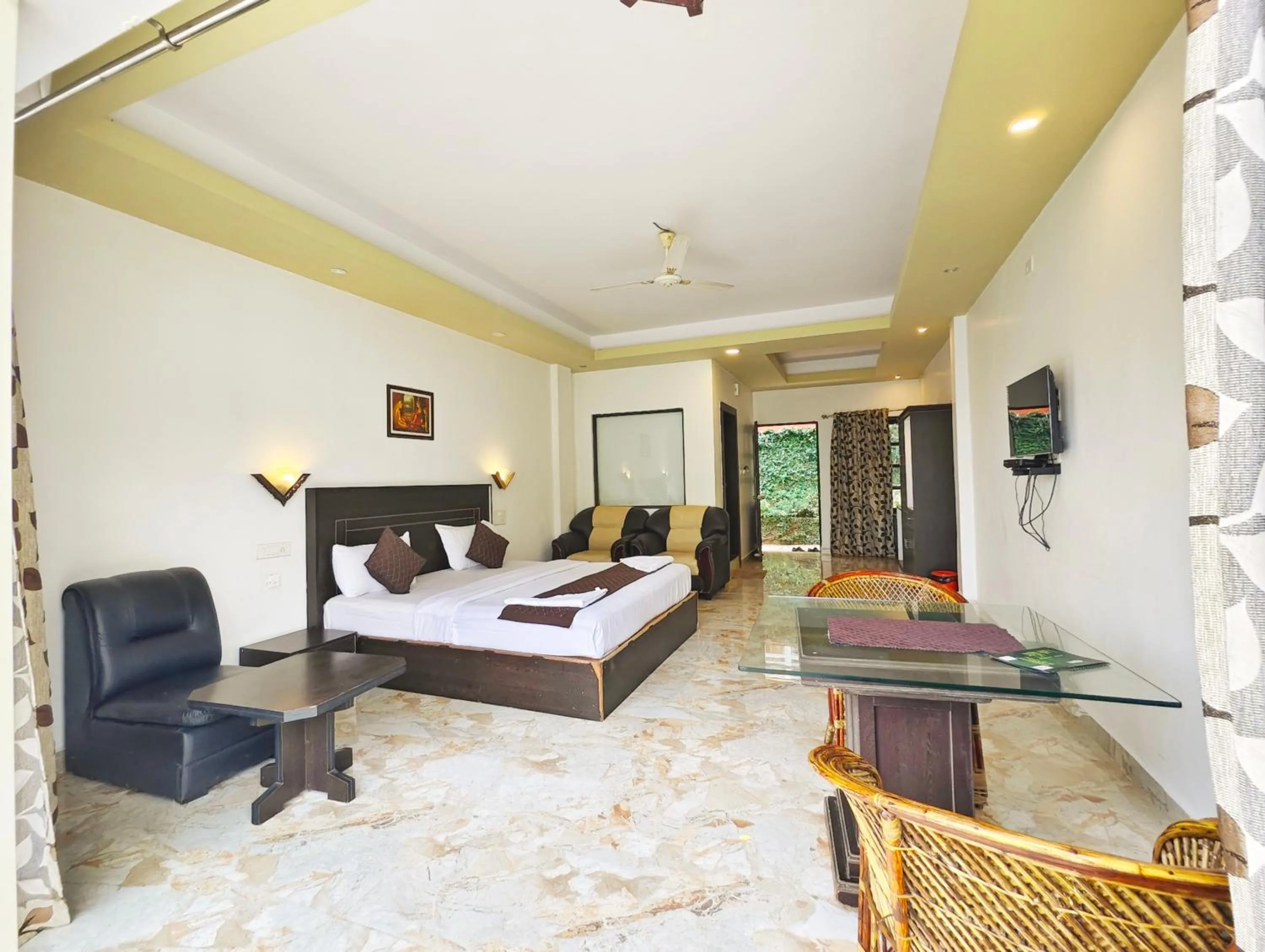 Bed in Green Trees Munnar