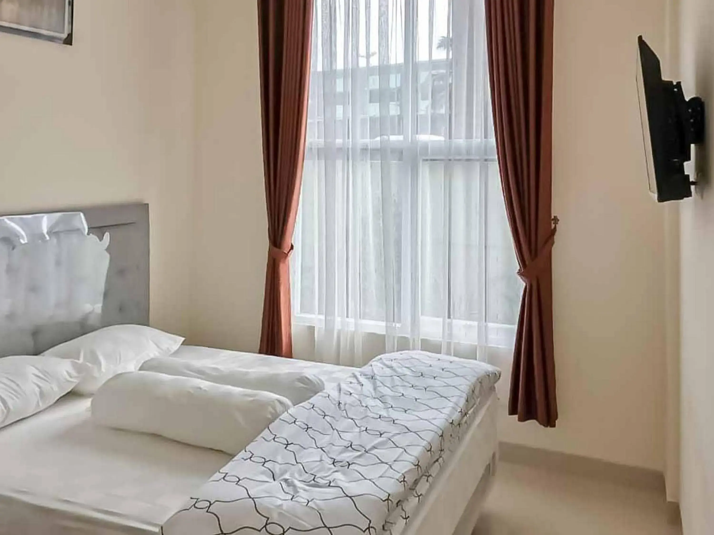 Bed in Wisma Talenta Mitra RedDoorz Bed in Wisma Talenta Mitra RedDoorz