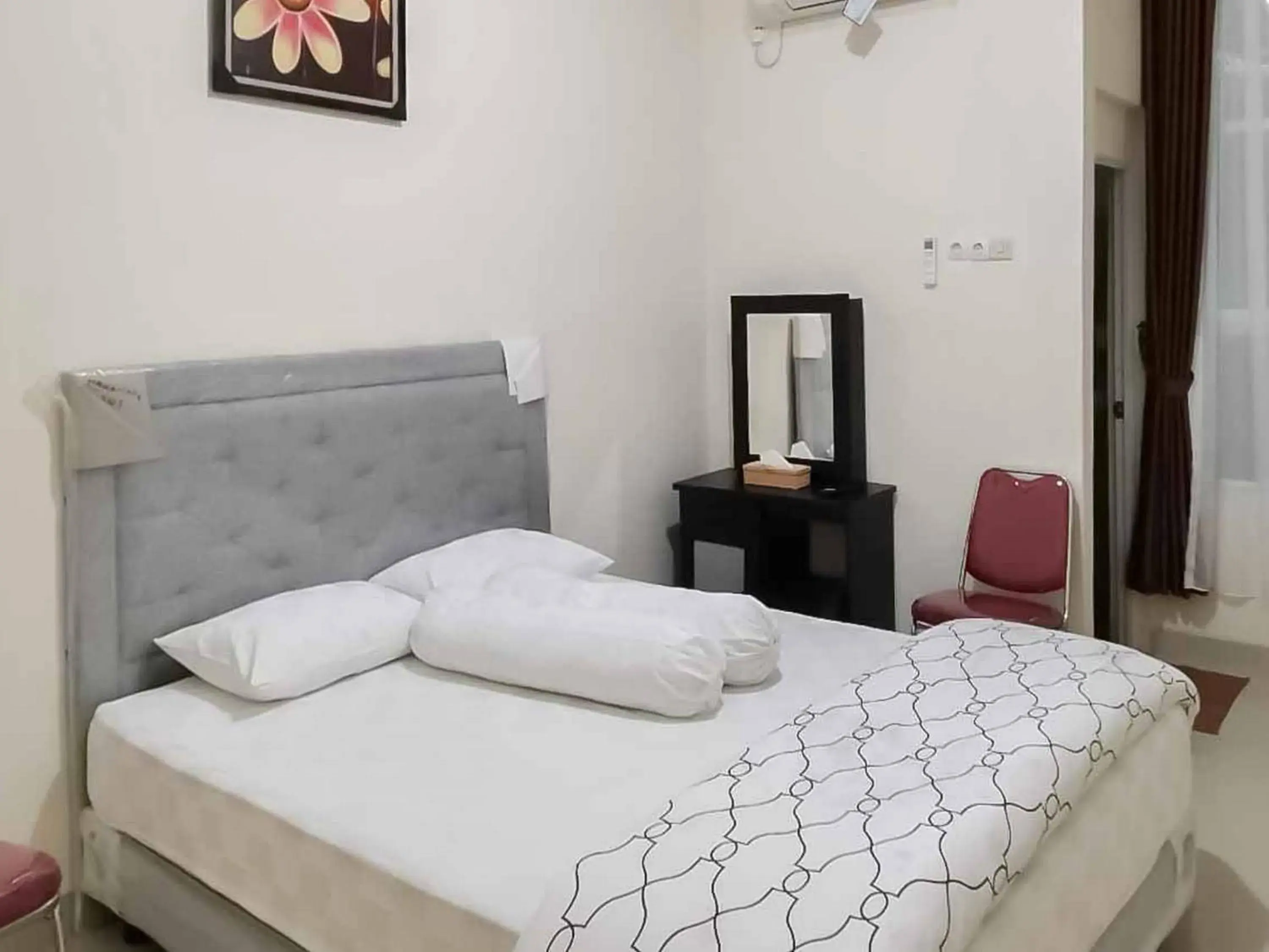 Bed in Wisma Talenta Mitra RedDoorz Bed in Wisma Talenta Mitra RedDoorz