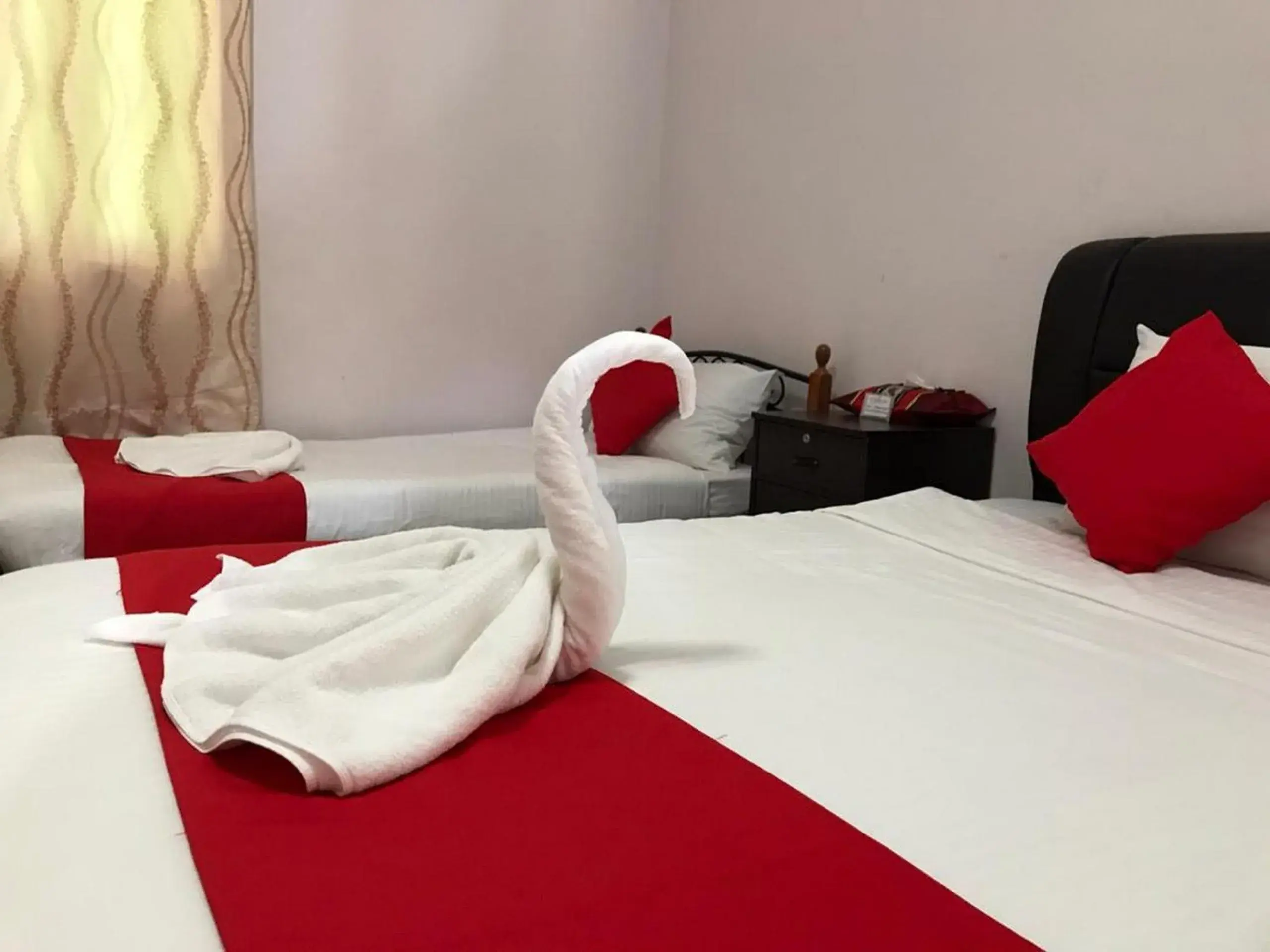 Triple Room with Private Bathroom in De Langkawi Resort and Convention Centre Triple Room with Private Bathroom in De Langkawi Resort and Convention Centre
