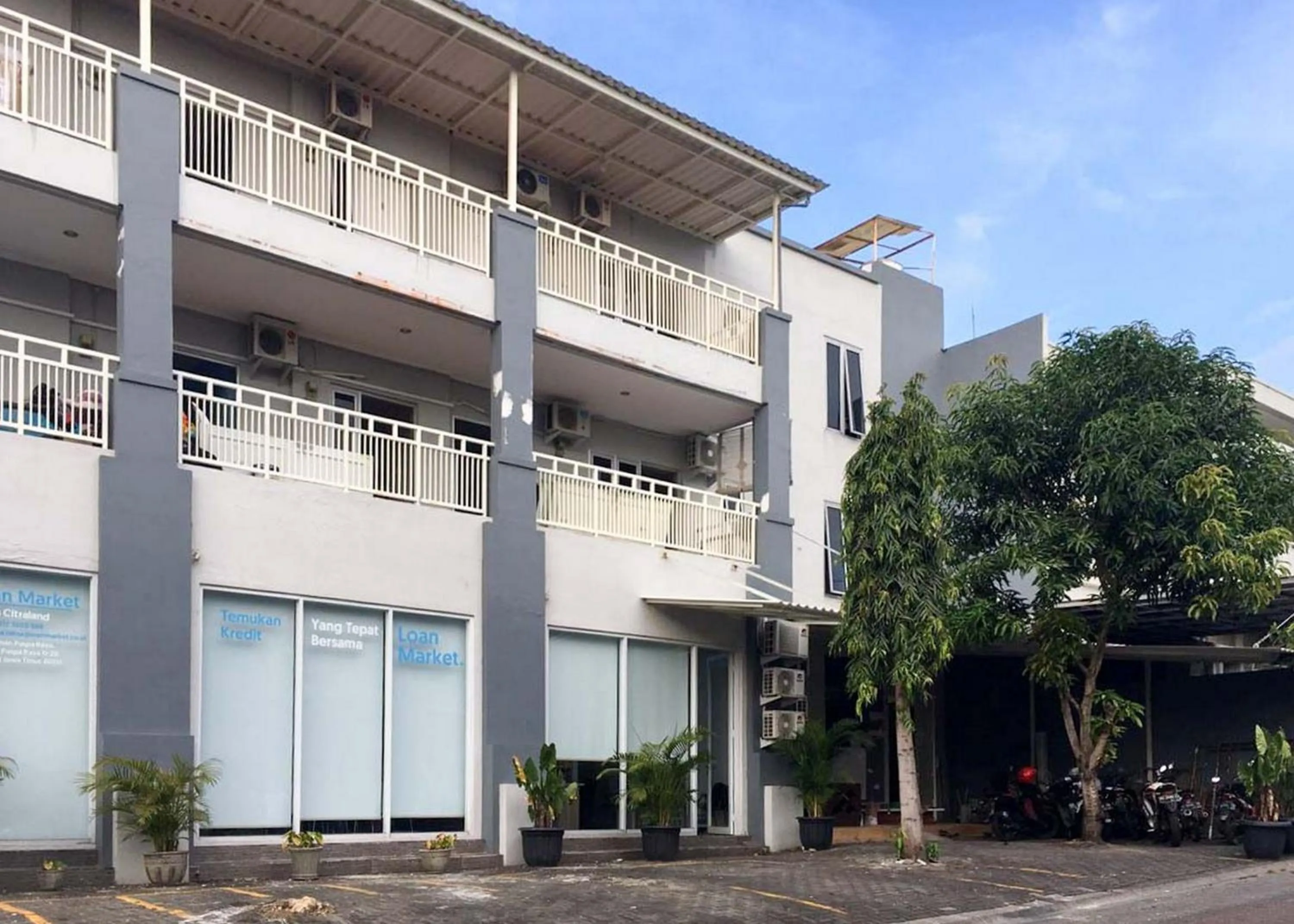 Property logo or sign in RedDoorz @ Citraland Surabaya