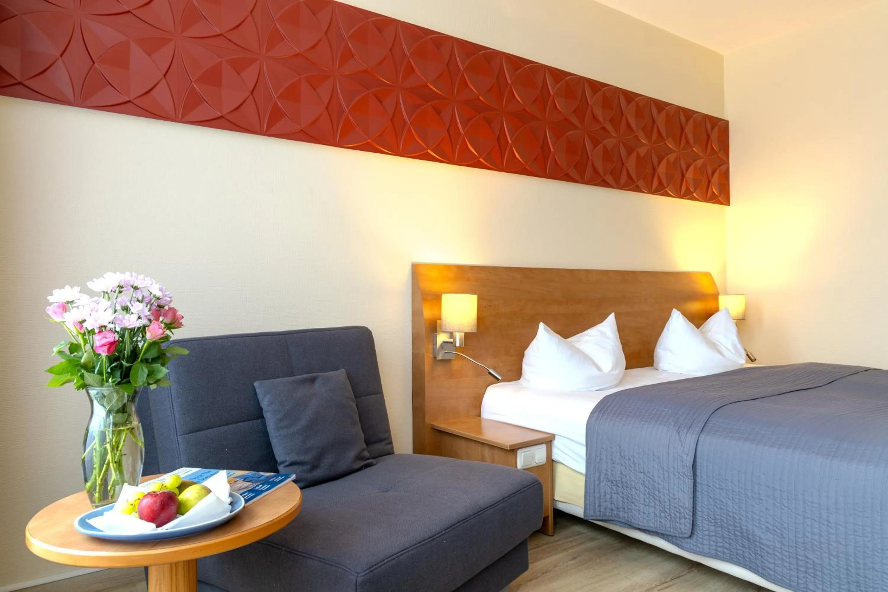 Photo of the whole room, Bed in Hotel Mercator Itzehoe-Klosterforst