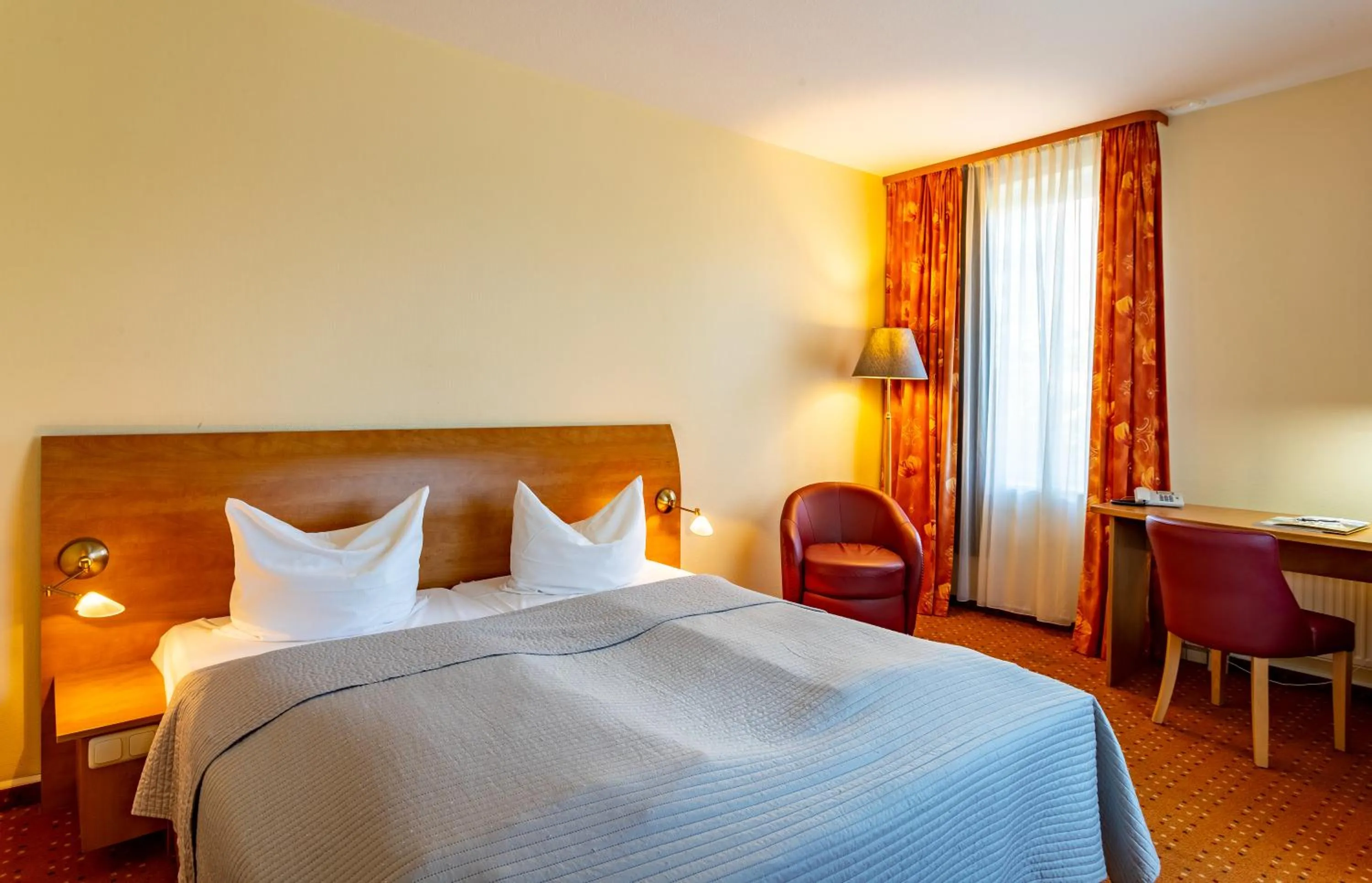 Photo of the whole room, Bed in Hotel Mercator Itzehoe-Klosterforst