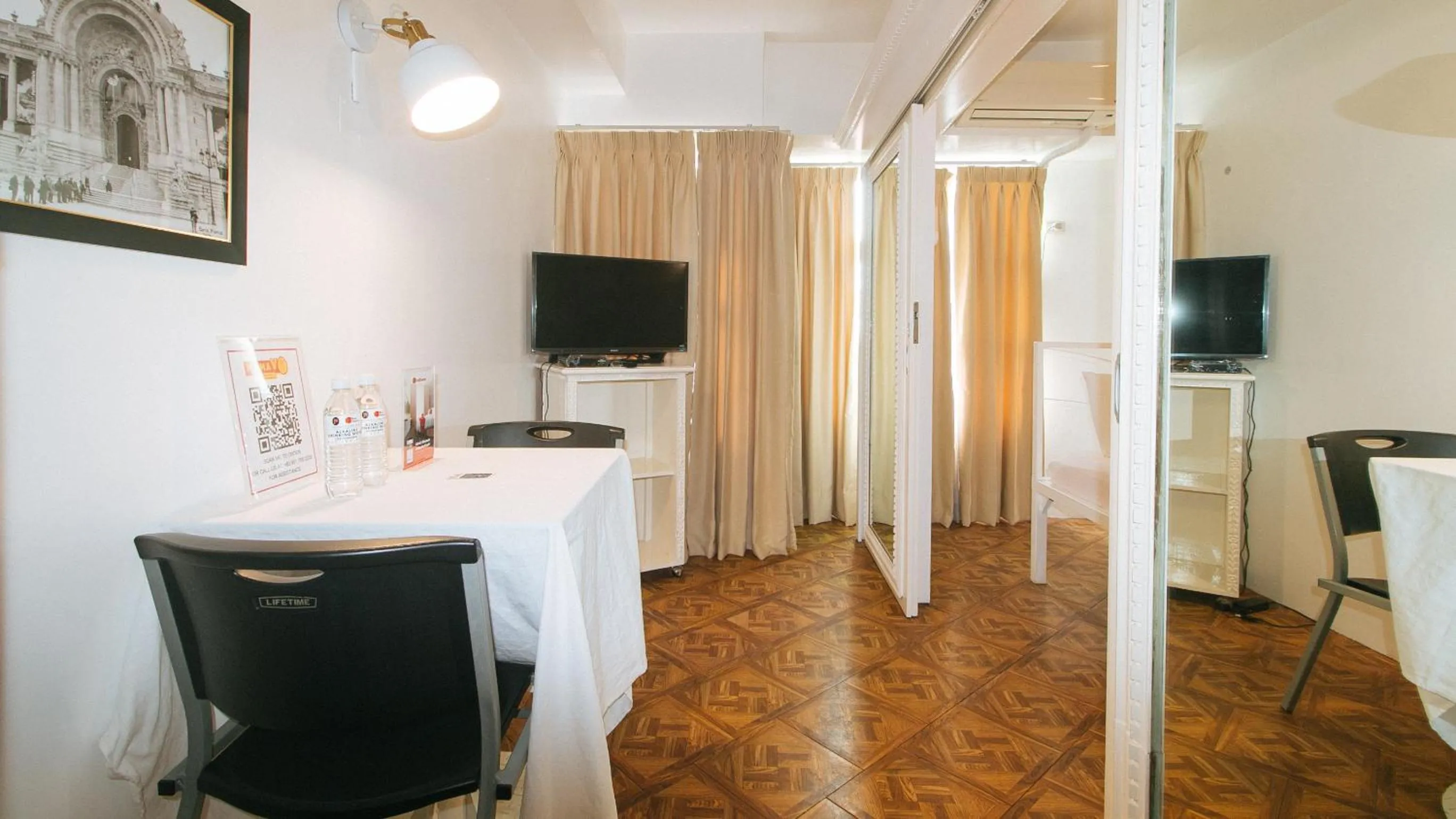 TV and multimedia in RedDoorz at The Providence Tower