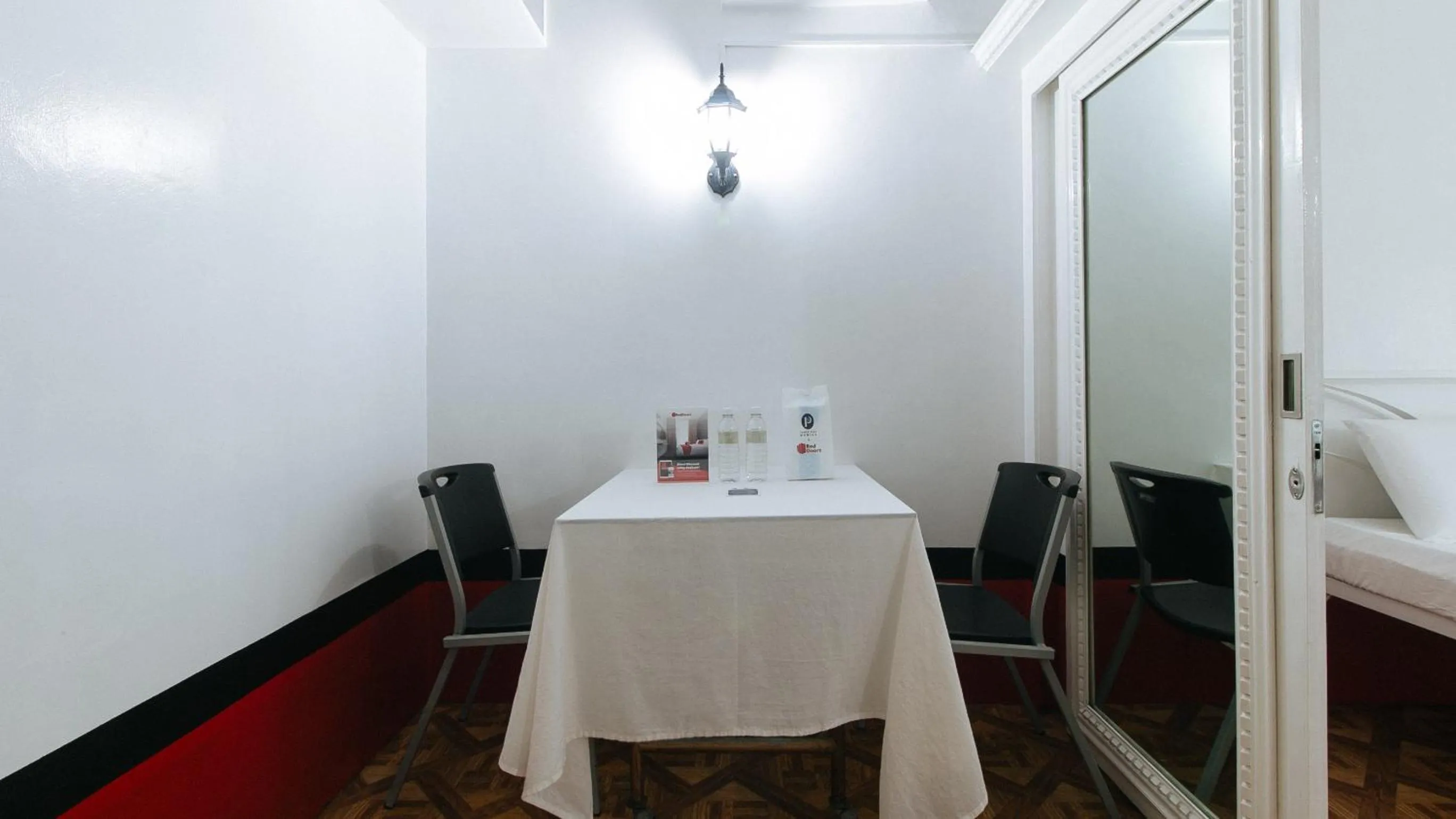 Dining area in RedDoorz at The Providence Tower