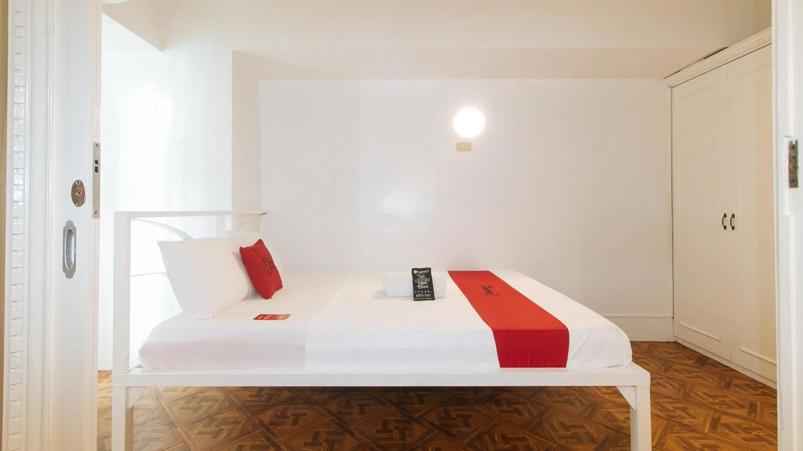 Bed in RedDoorz at The Providence Tower