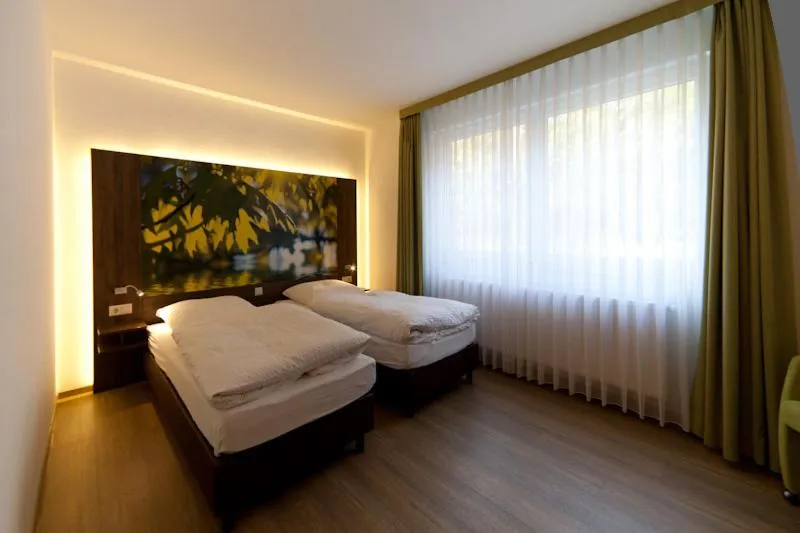 Photo of the whole room, Bed in Waldhotel