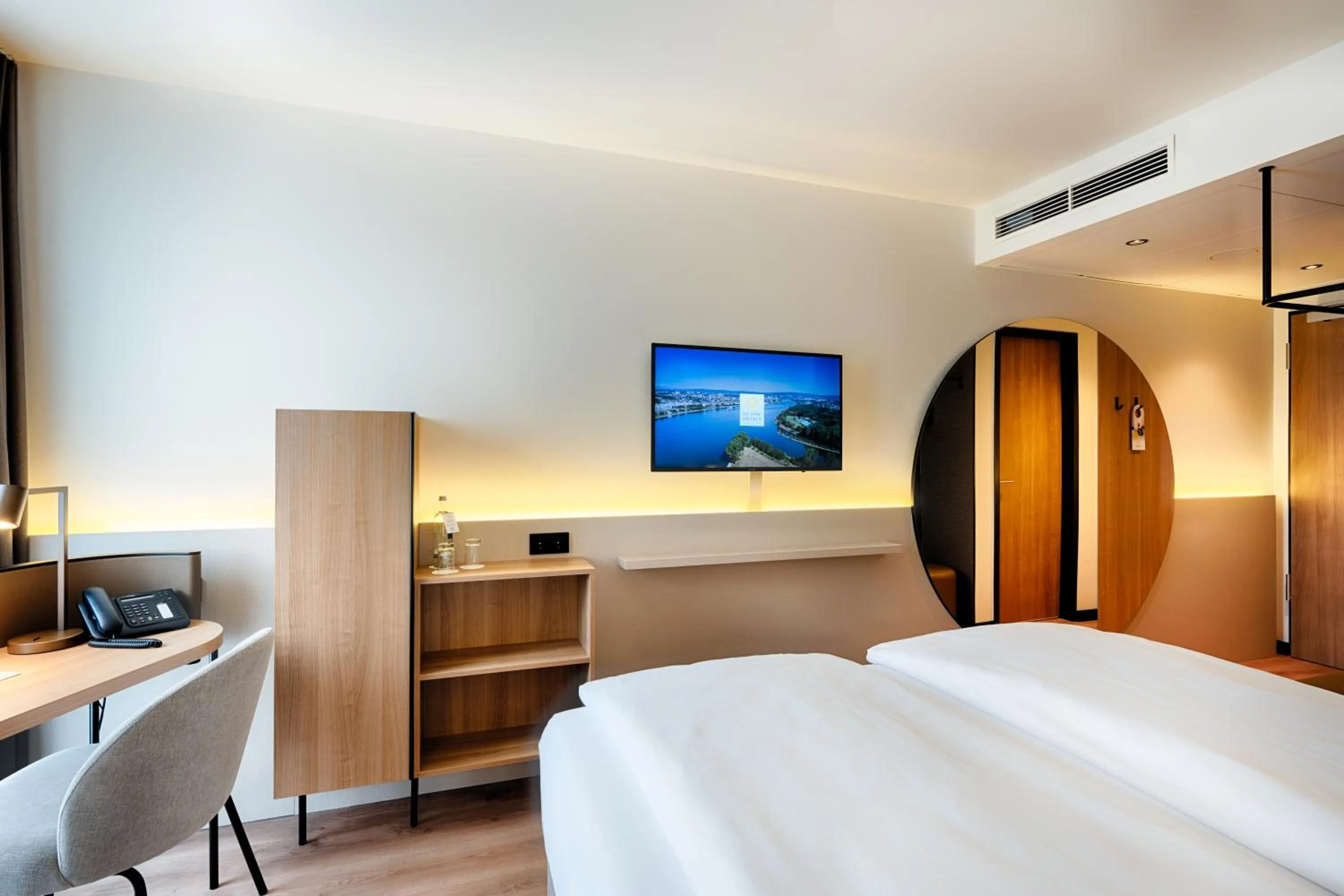 Photo of the whole room, Bed in Welcome Hotel Darmstadt City Center