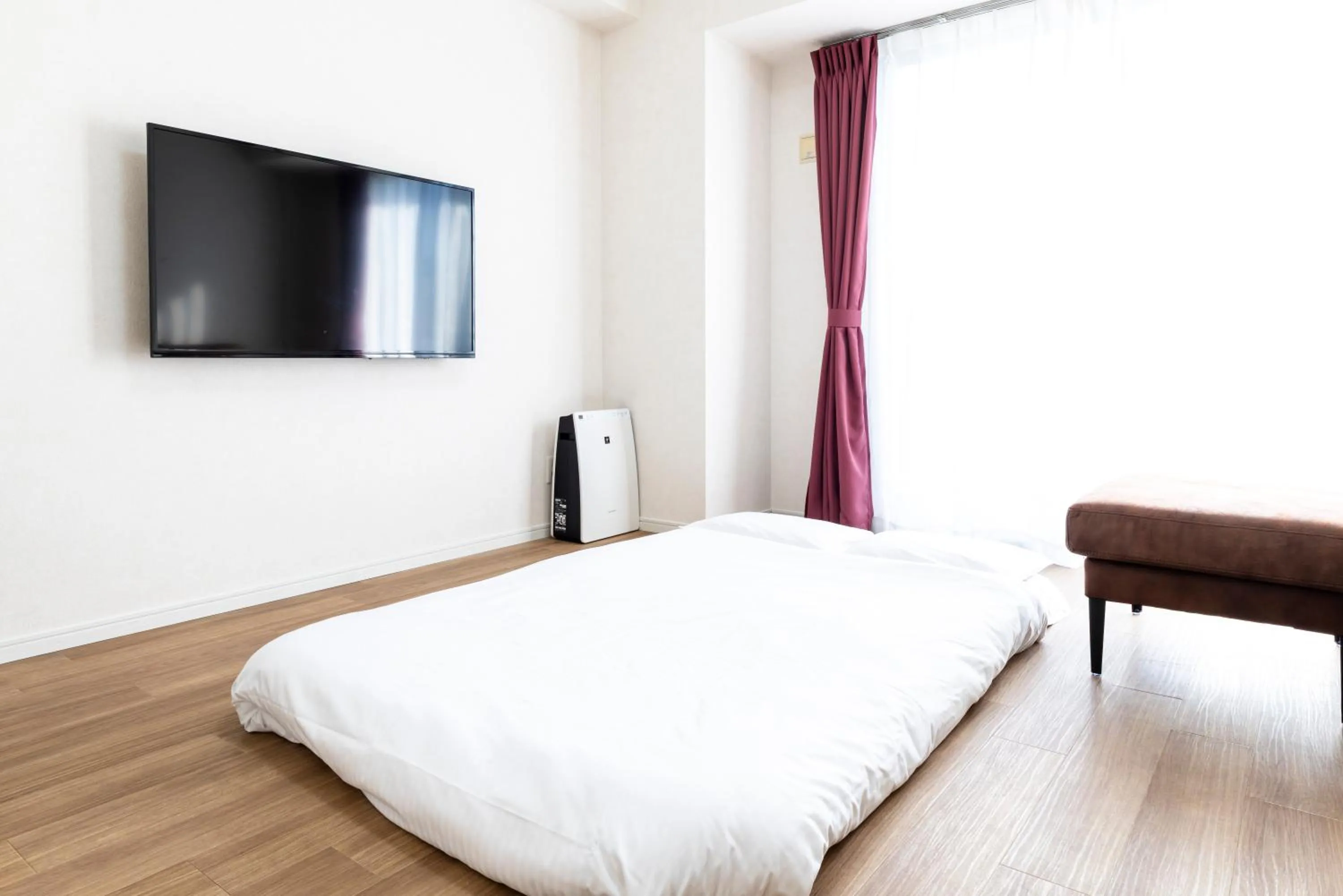 Bed in Riverside Inn Hakata