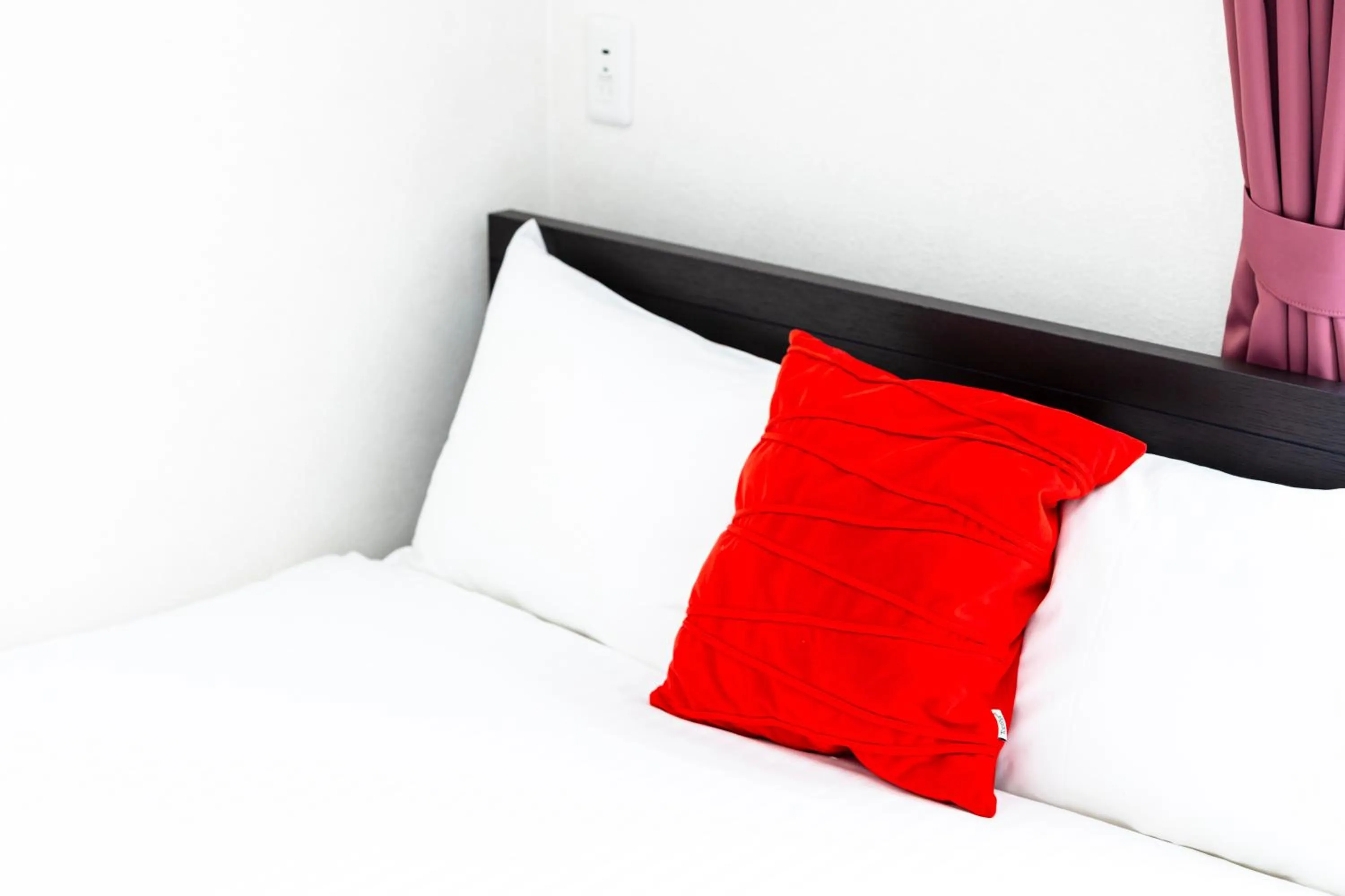 Bed in Riverside Inn Hakata