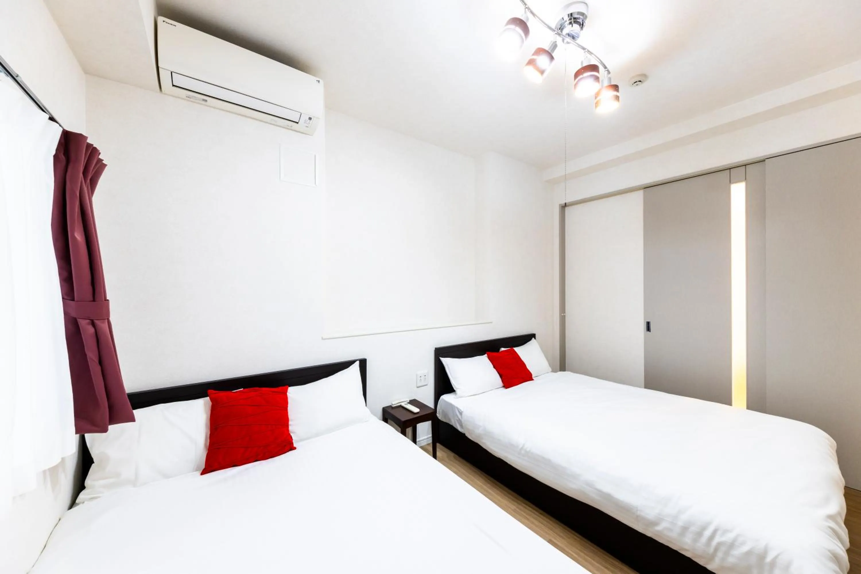 Bed in Riverside Inn Hakata